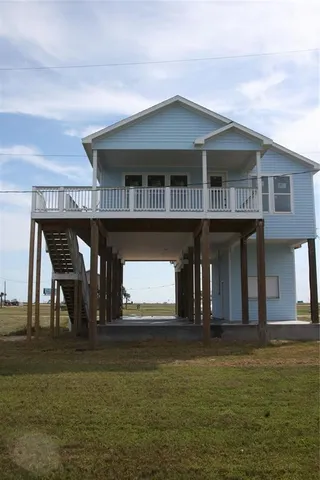 a front view of a house with balcony