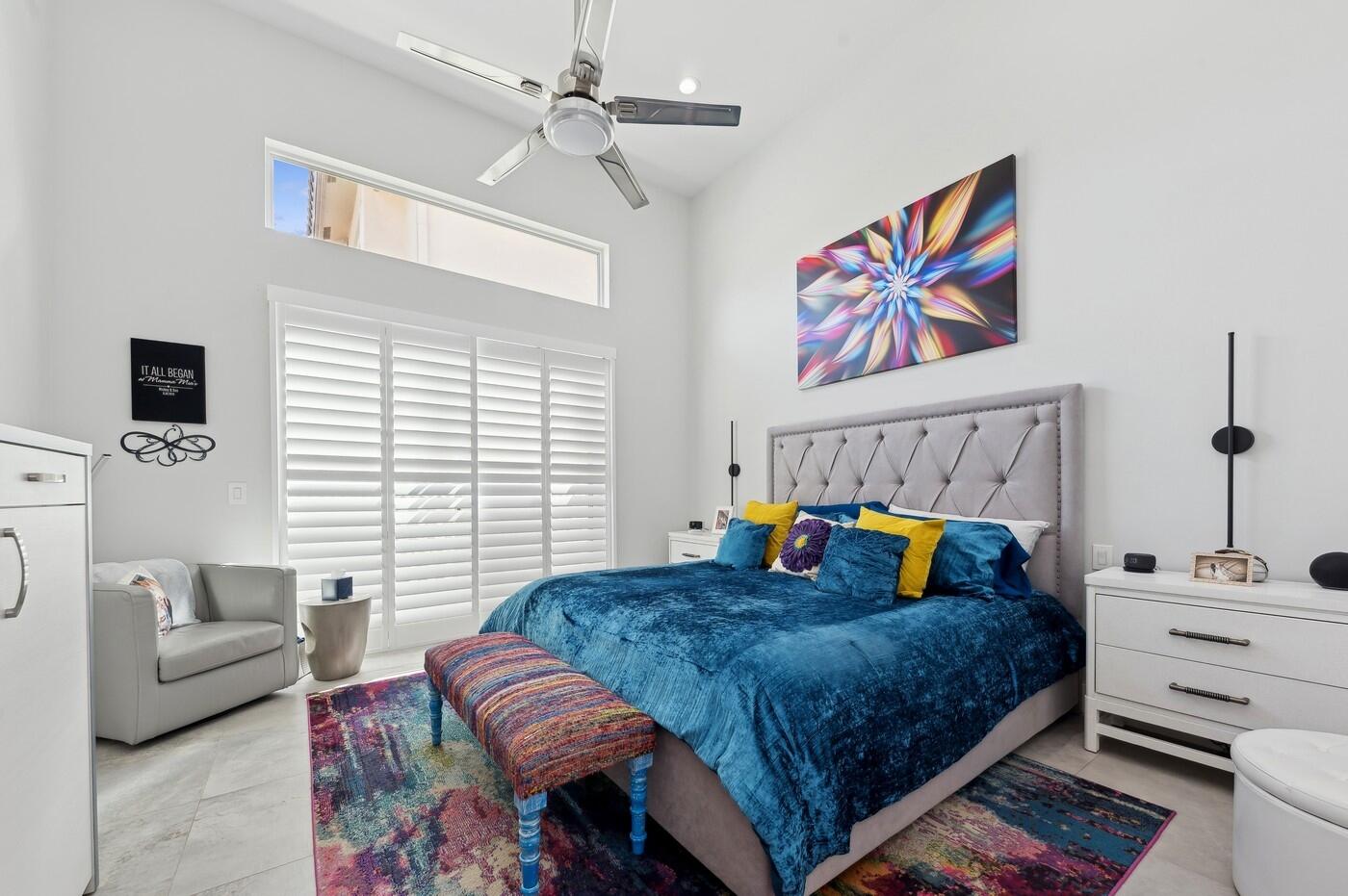 2558 Northwest 52nd Street Boca Raton, FL 33496 - Photo 15 of 27 a bedroom with bed and a couch