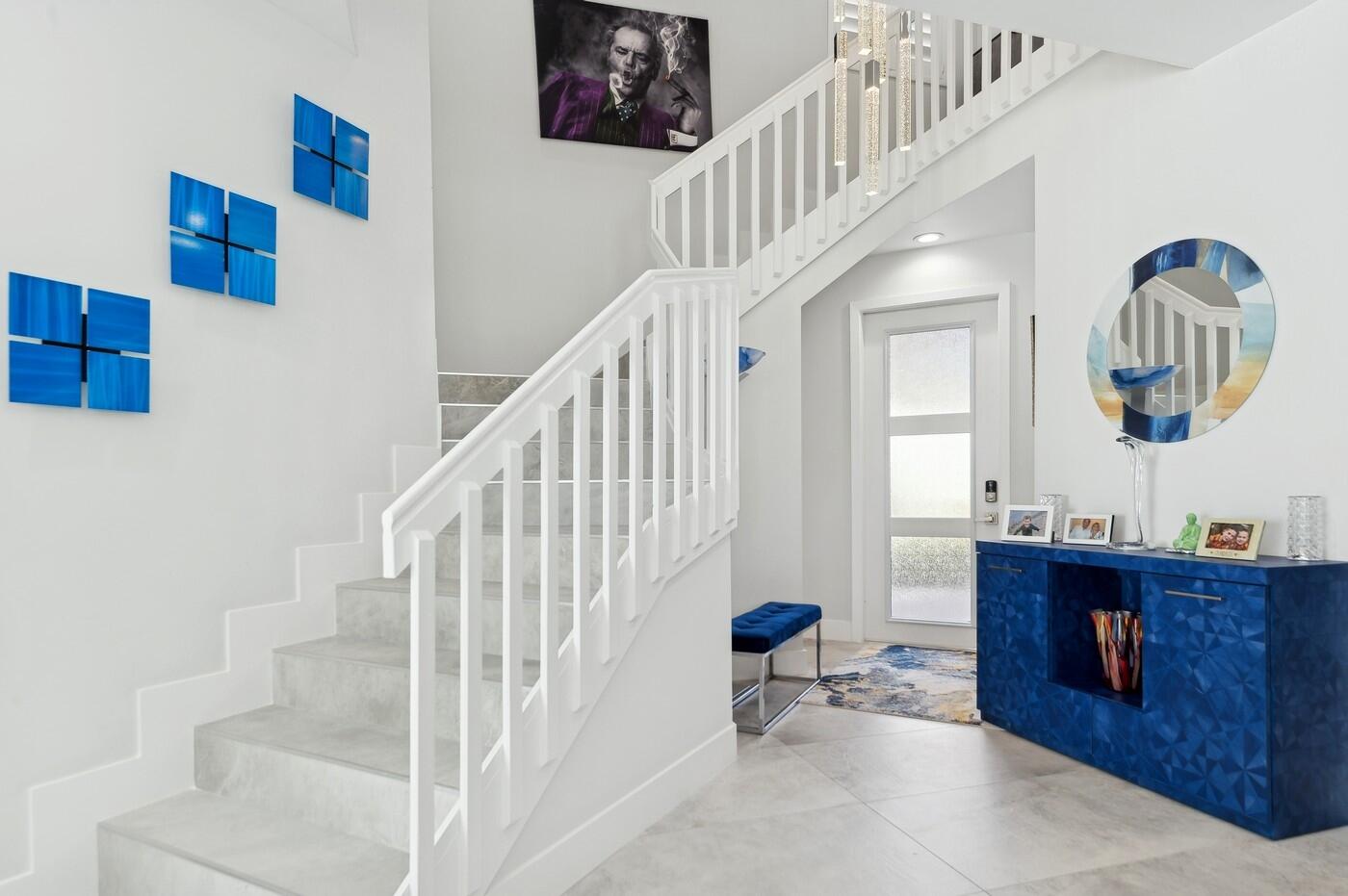 2558 Northwest 52nd Street Boca Raton, FL 33496 - Photo 3 of 27 a living room with couches and pool table