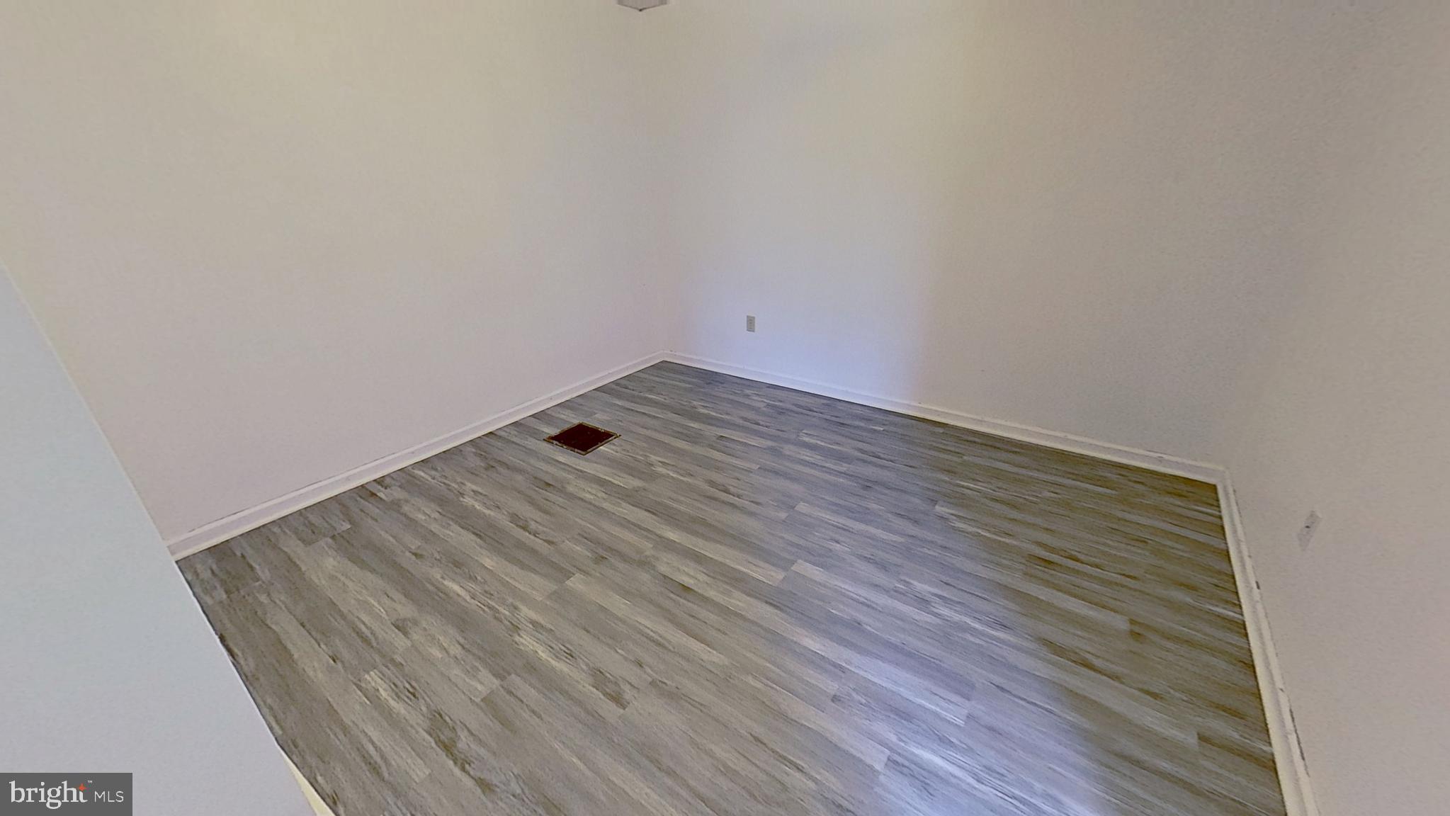 648 Broadway, Unit A Hanover, PA 17331 - Photo 6 of 10 a view of wooden floor in a room