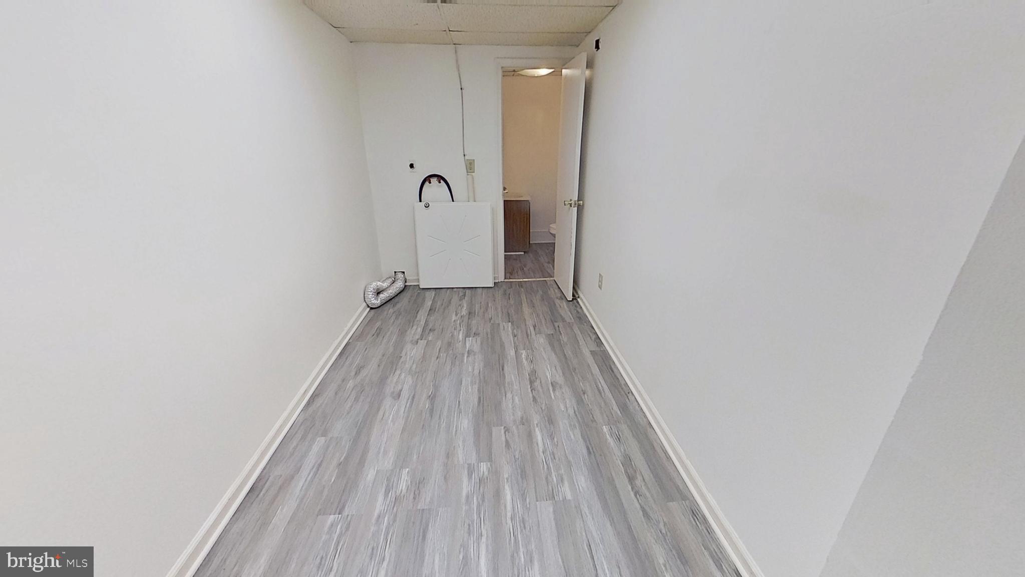 648 Broadway, Unit A Hanover, PA 17331 - Photo 8 of 10 a view of a room with wooden floor