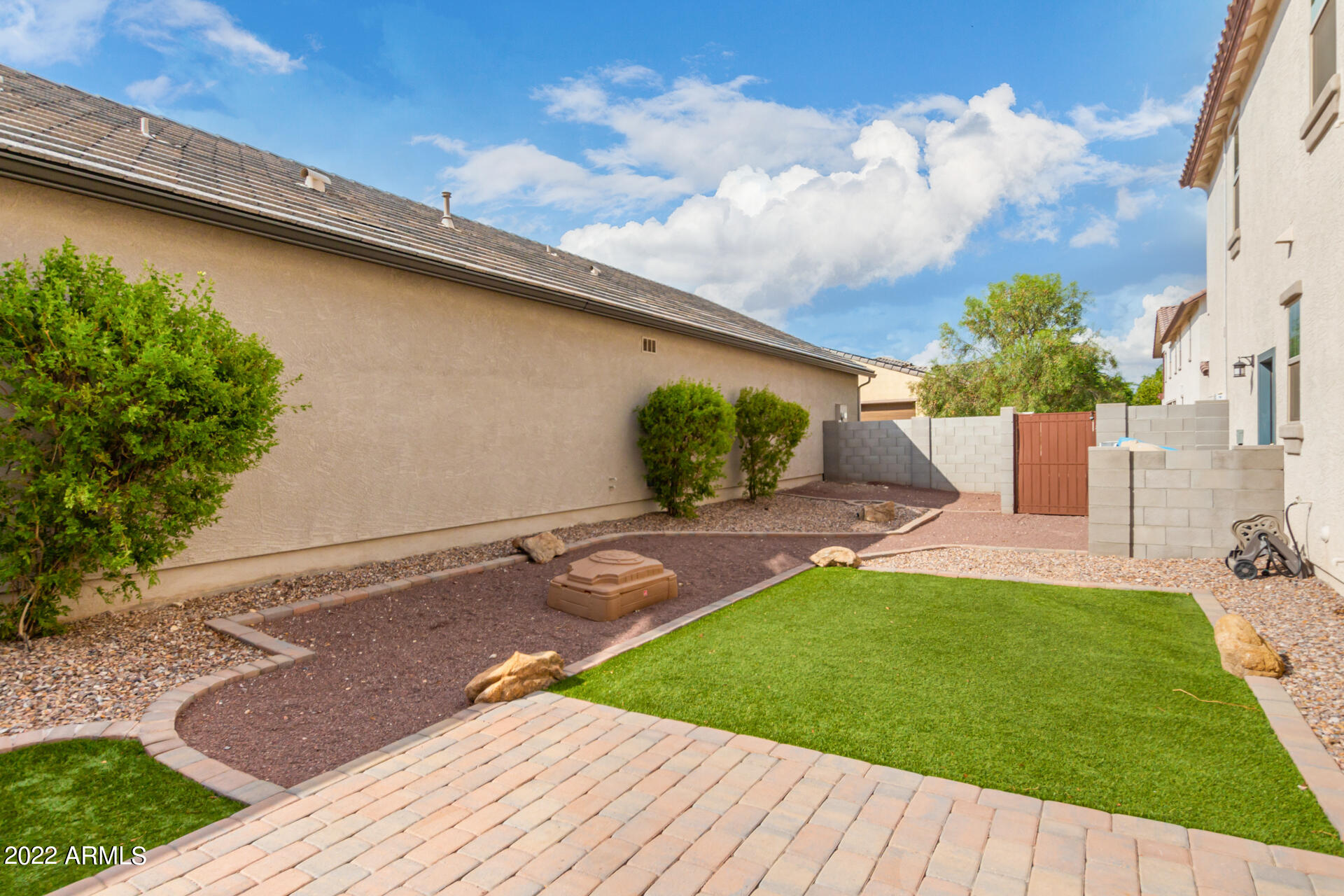 2345 North Alsap Road Buckeye, AZ 85396 - Photo 30 of 50 a backyard of a house with lots of green space