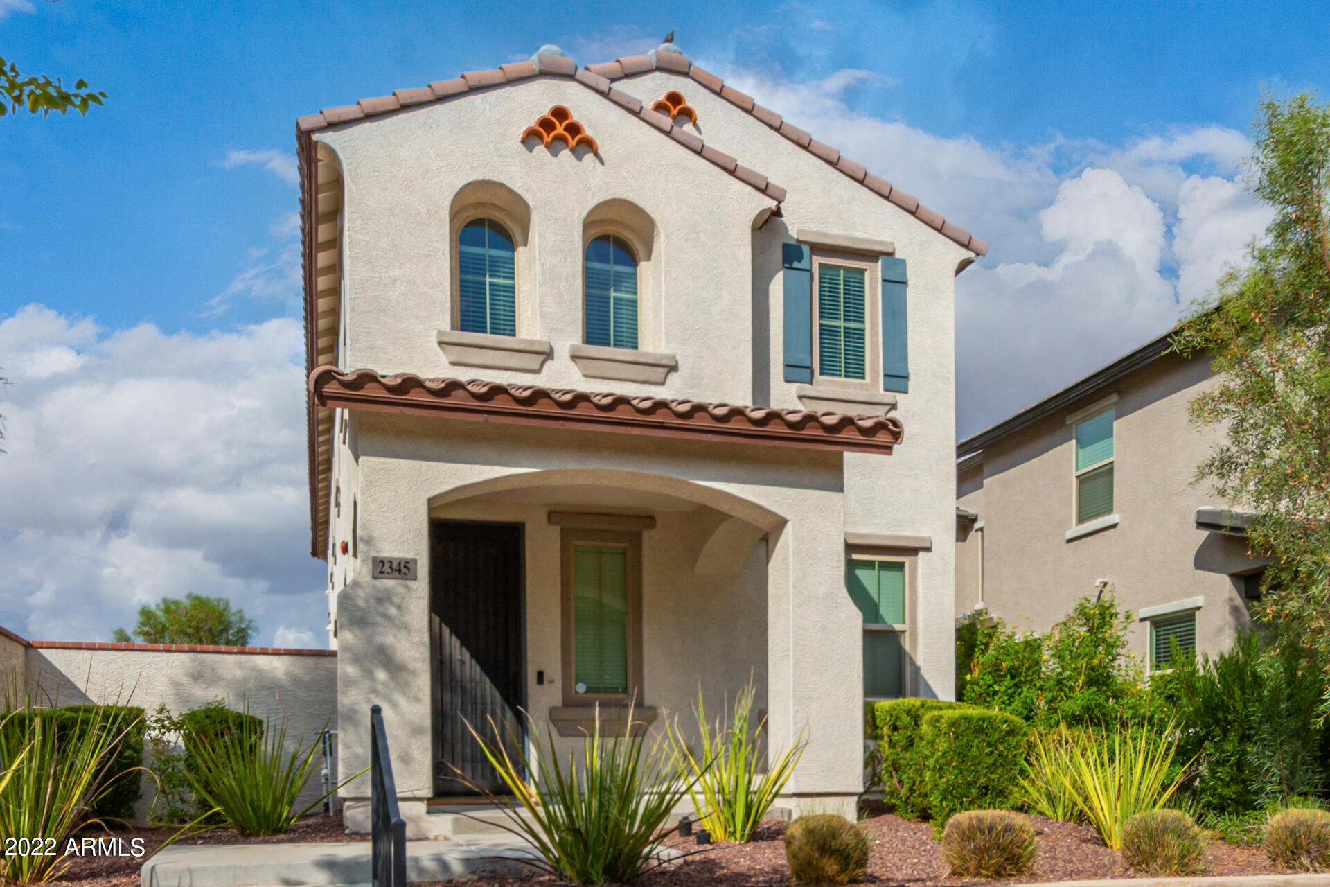 2345 North Alsap Road Buckeye, AZ 85396 - Photo 4 of 50 a front view of a house with a yard