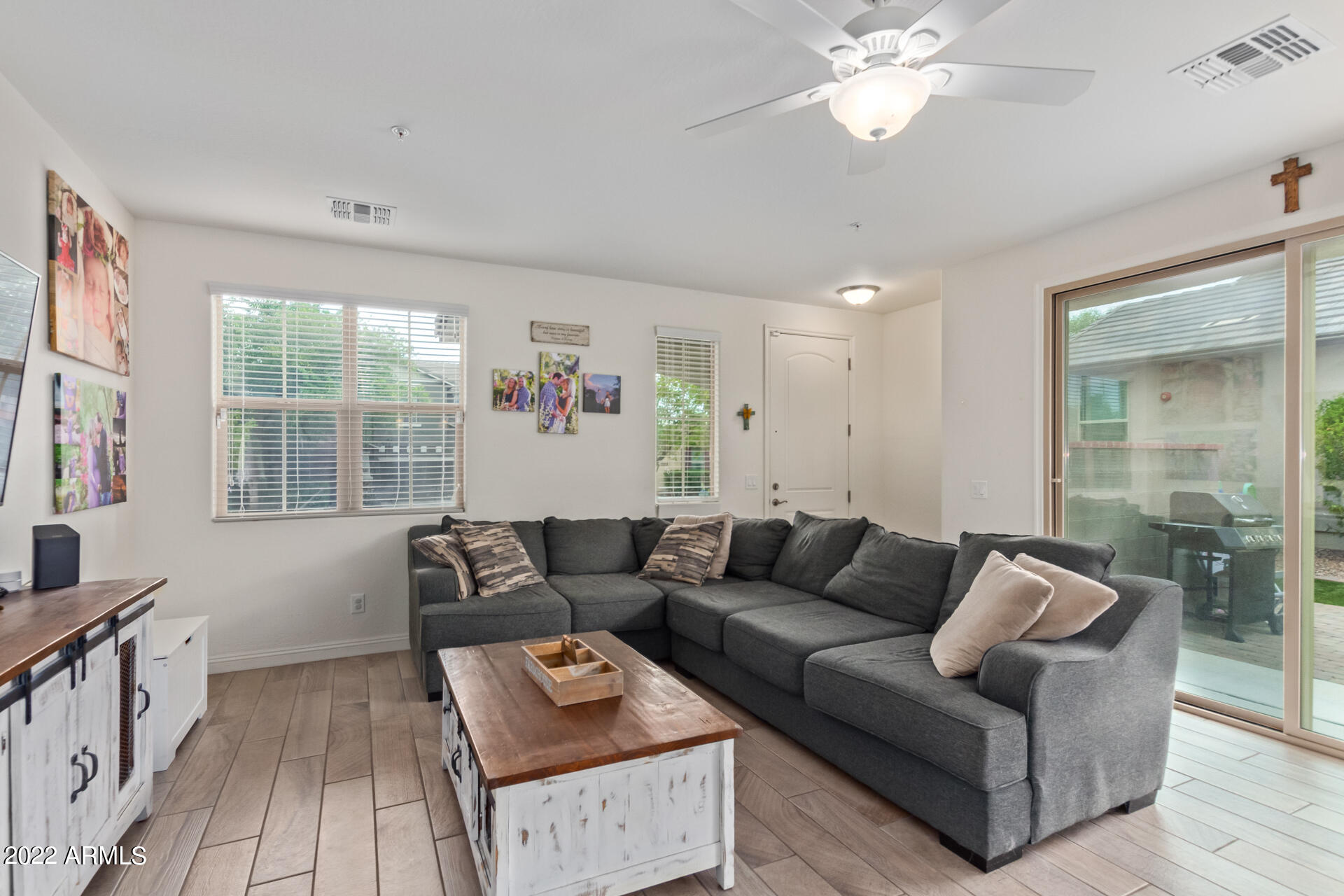 2345 North Alsap Road Buckeye, AZ 85396 - Photo 7 of 50 a living room with furniture and a large window