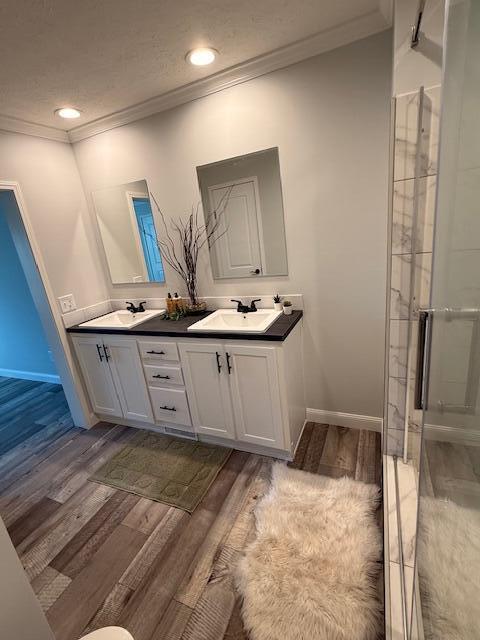 2475 Coles Creek Road Rocky Mount, VA 24151 - Photo 32 of 42 a bathroom with a sink double vanity and a mirror