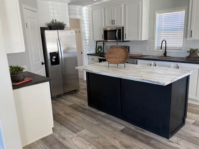 2475 Coles Creek Road Rocky Mount, VA 24151 - Photo 9 of 42 a kitchen with stainless steel appliances a sink cabinets and refrigerator