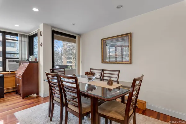 a view of a dining room with furniture window and outside view
