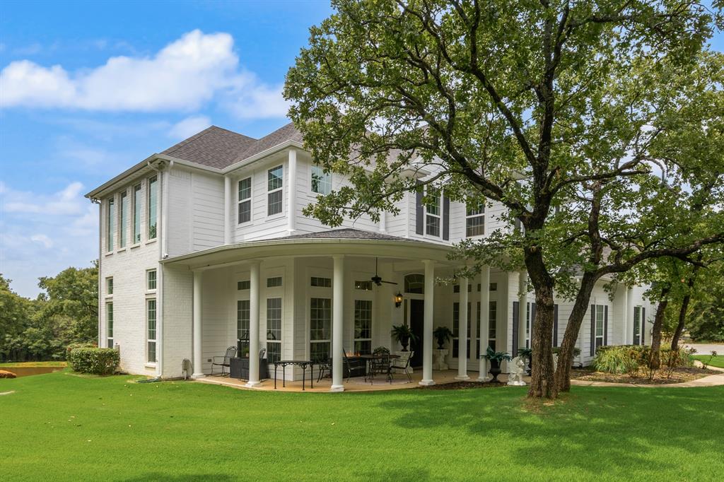 1619 Bloomfield Road Valley View, TX 76272 - Photo 2 of 39 Front of home with views of the pond.