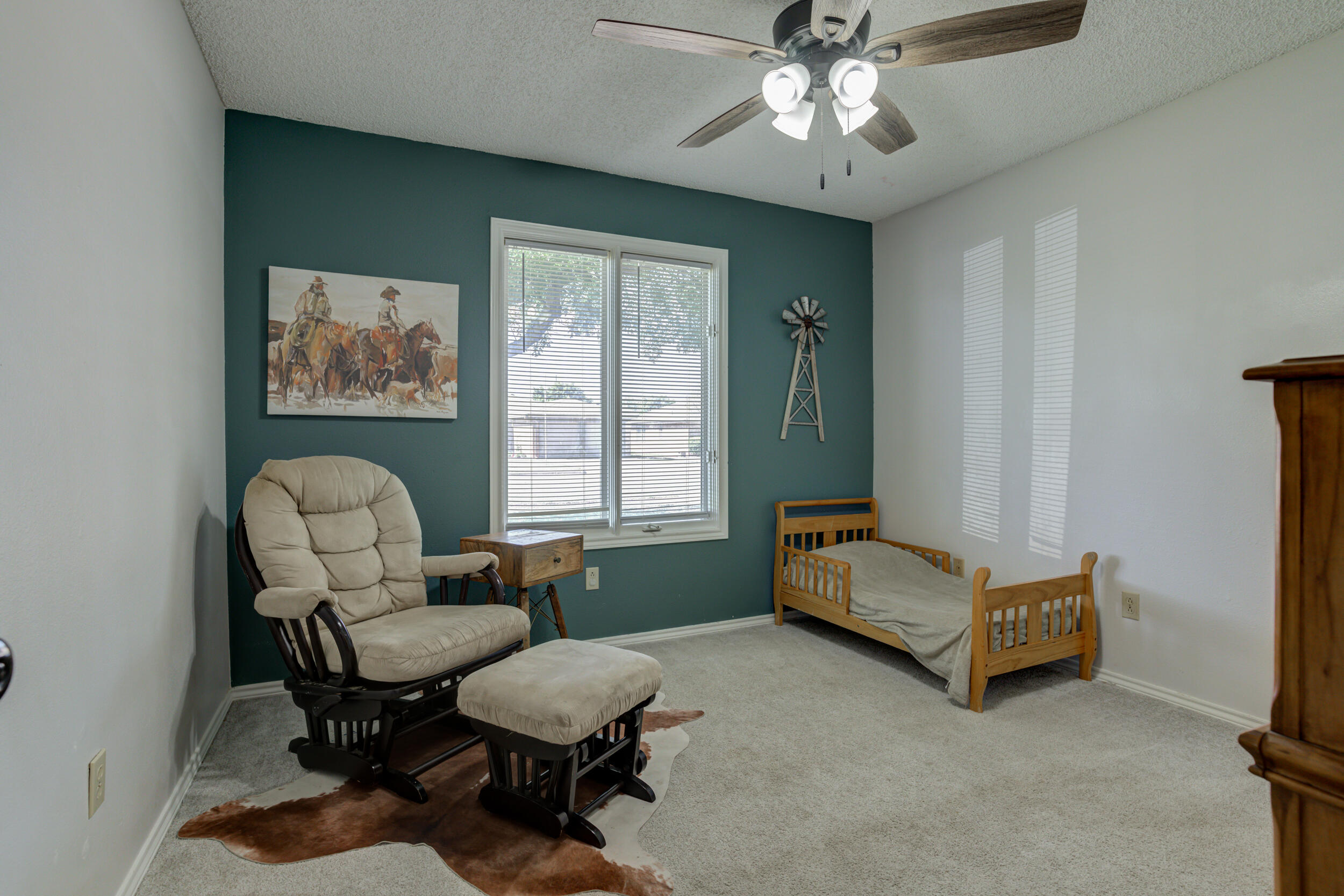 3712 103rd Street Lubbock, TX 79423 - Photo 25 of 43 a living room with furniture and a window