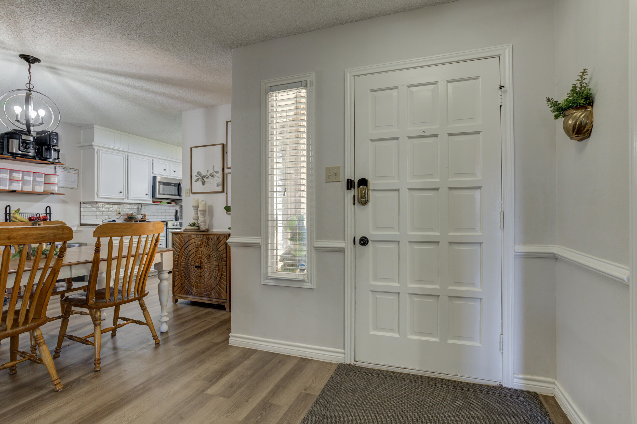 3712 103rd Street Lubbock, TX 79423 - Photo 4 of 43 a view of a kitchen and dining room