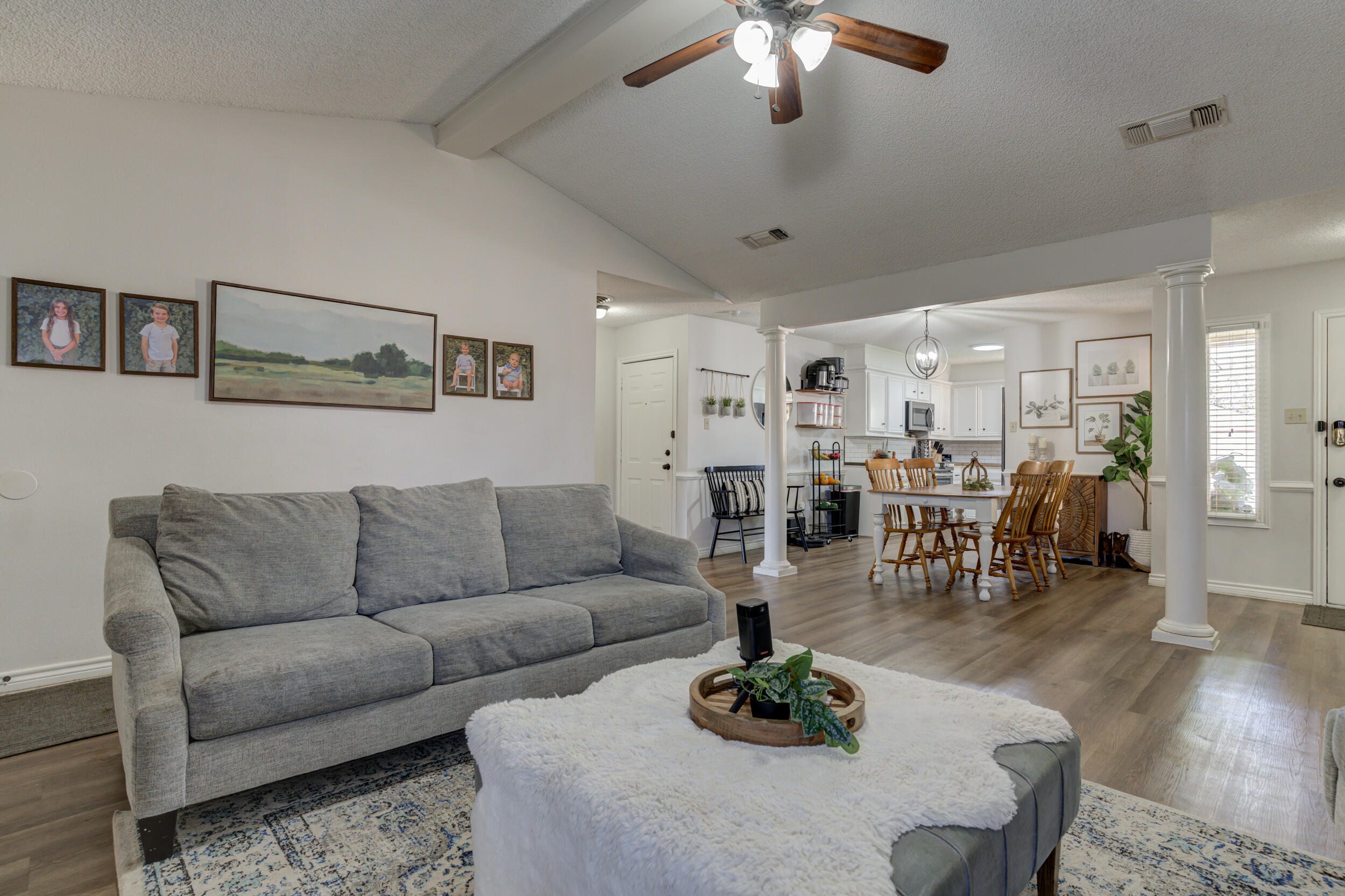 3712 103rd Street Lubbock, TX 79423 - Photo 10 of 43 a living room with furniture and wooden floor