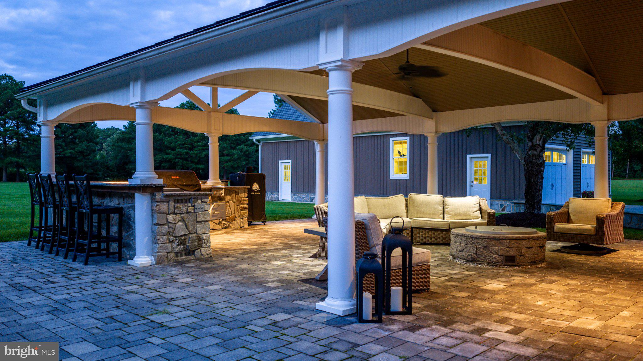 4401 Grove Road Trappe, MD 21673 - Photo 64 of 73 Elegant outdoor retreat at twilight.