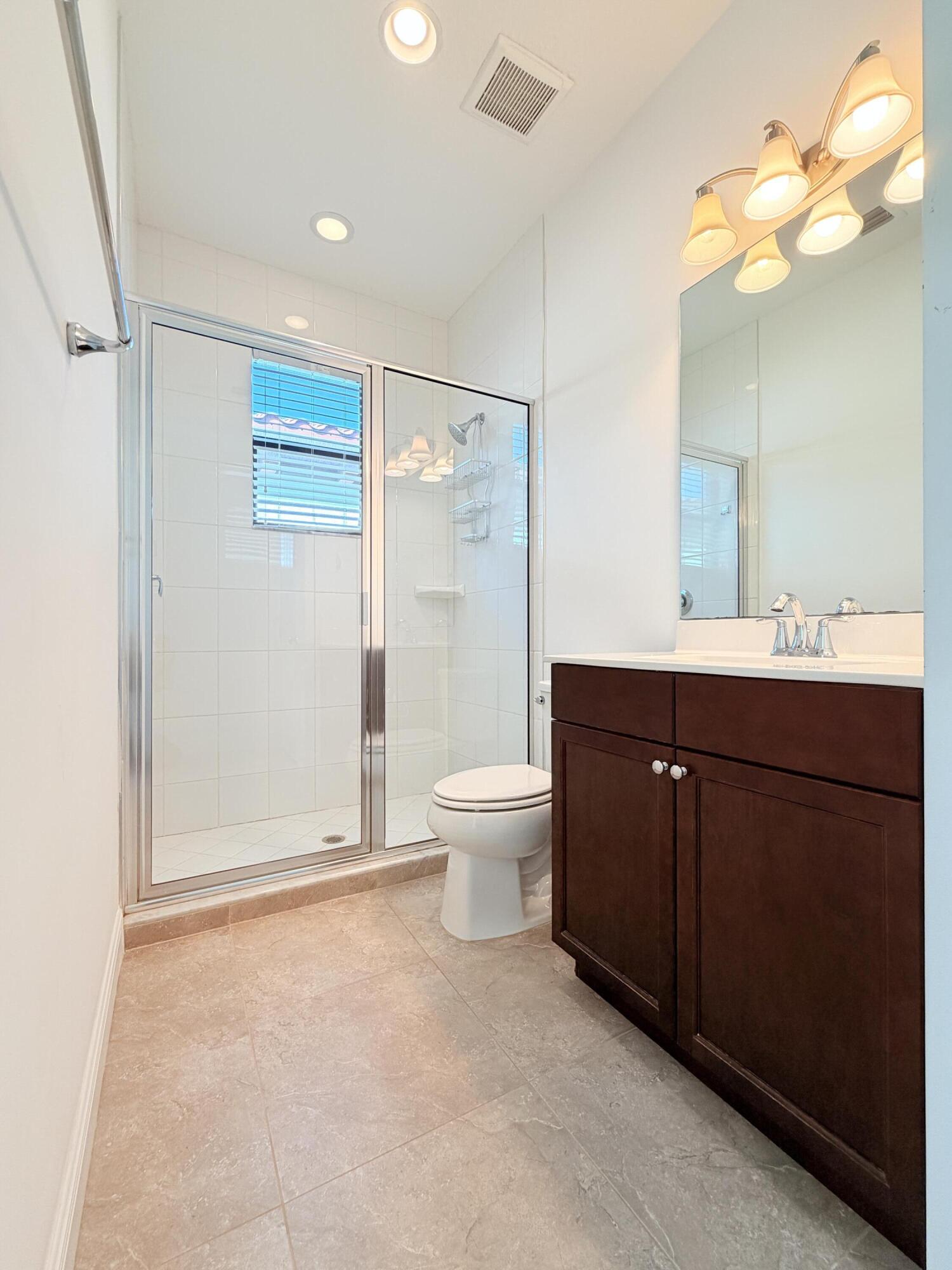 2074 Dickens Terrace Palm Beach Gardens, FL 33418 - Photo 28 of 65 Guest Bathroom 2