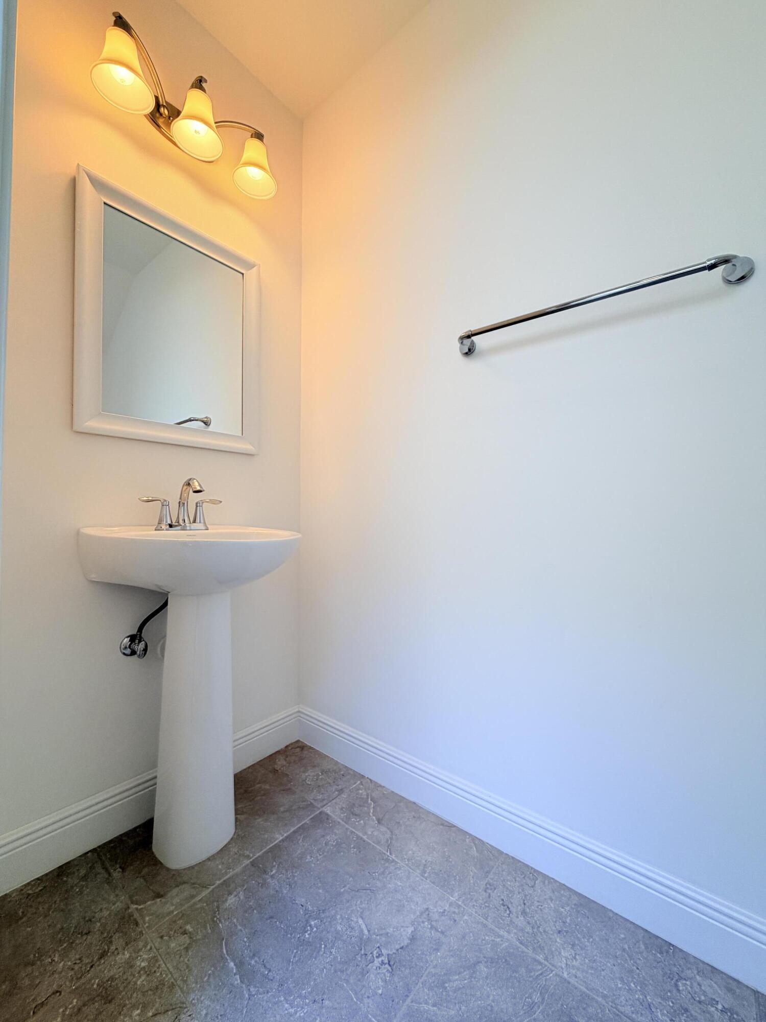 2074 Dickens Terrace Palm Beach Gardens, FL 33418 - Photo 36 of 65 Patio Powder Room