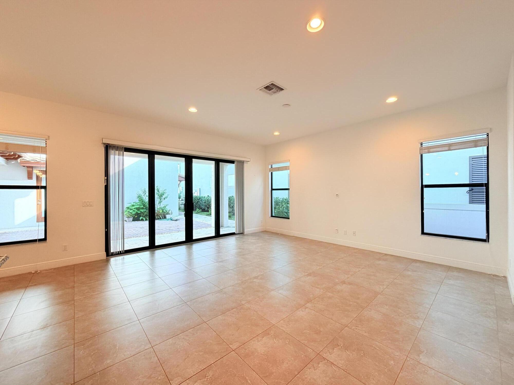 2074 Dickens Terrace Palm Beach Gardens, FL 33418 - Photo 9 of 65 Family Room 1