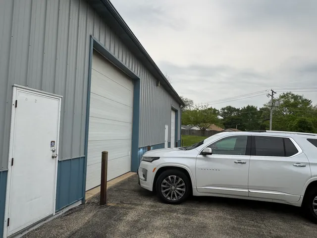 a view of a car that is parked in a parking lot