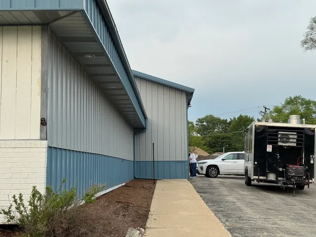 a view of outdoor space with deck and barbeque oven