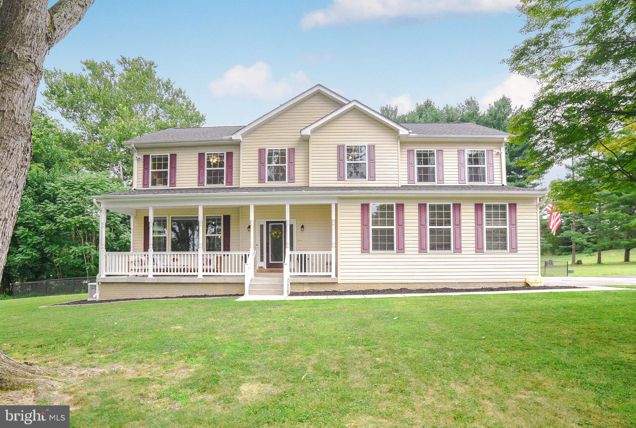 2160 Lowery Road Huntingtown, MD 20639 - Photo 1 of 53 a front view of a house with a yard
