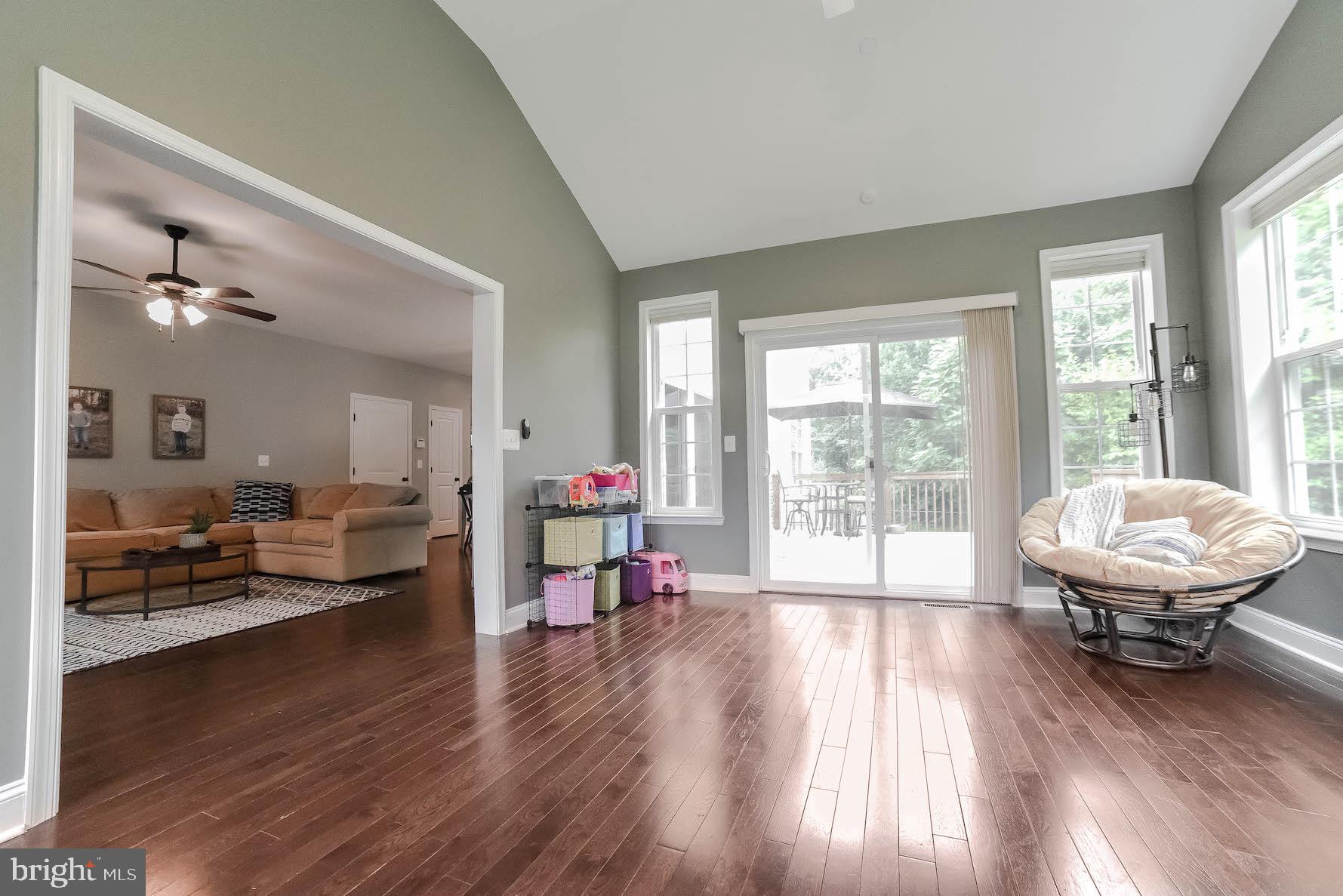 2160 Lowery Road Huntingtown, MD 20639 - Photo 22 of 53 a living room with furniture and a large window