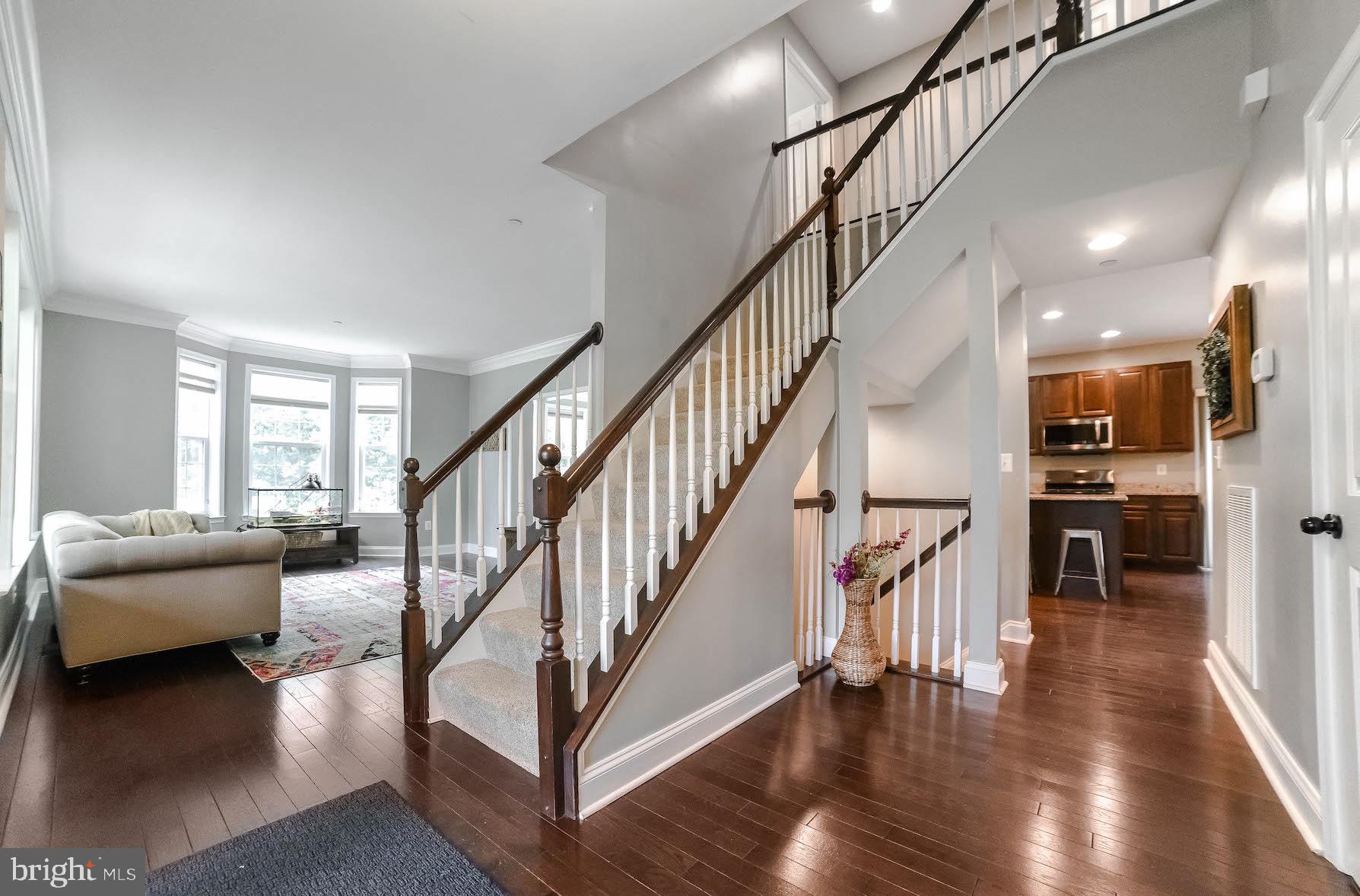 2160 Lowery Road Huntingtown, MD 20639 - Photo 4 of 53 a view of entryway and hall with wooden floor