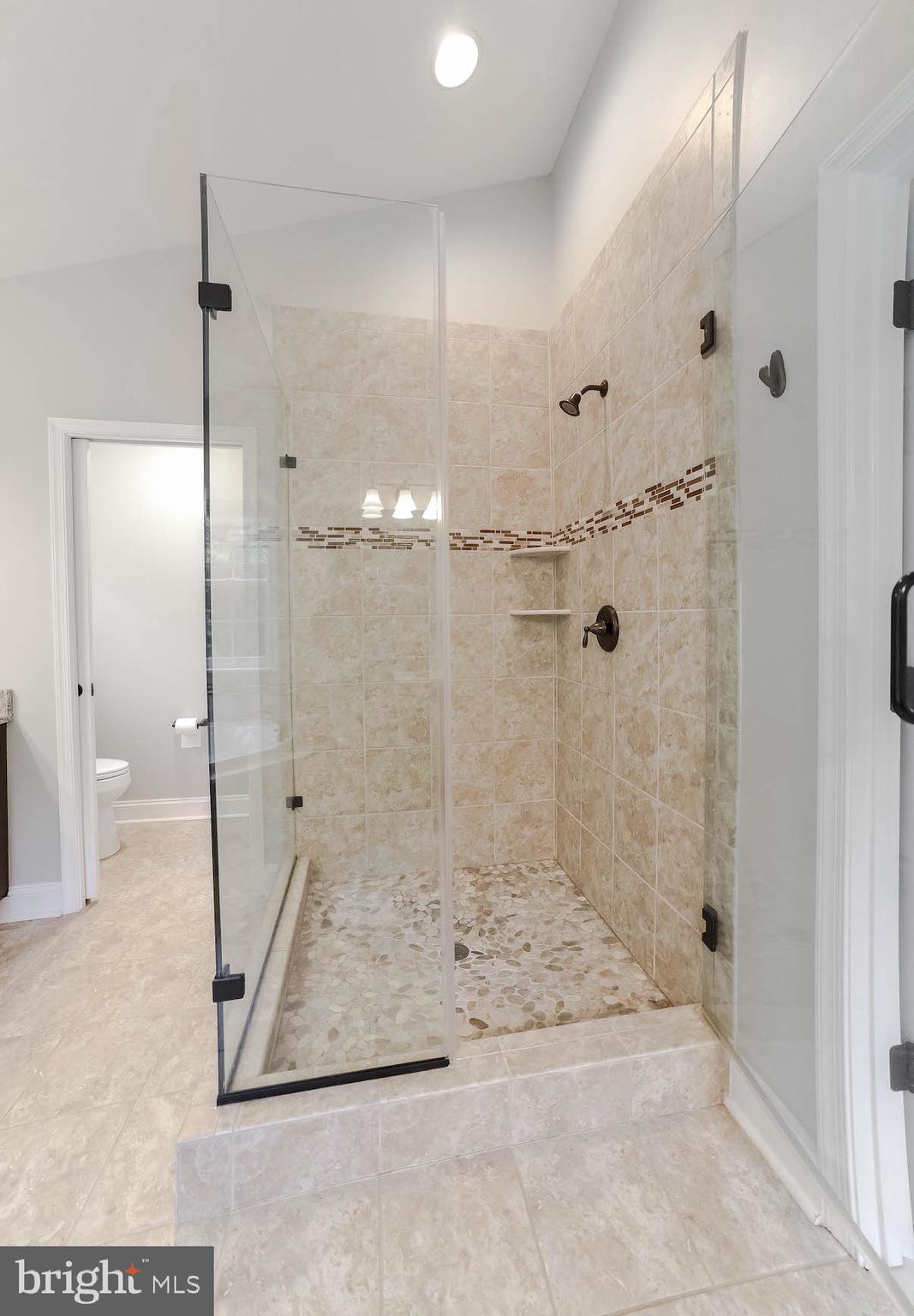 2160 Lowery Road Huntingtown, MD 20639 - Photo 39 of 53 a bathroom with a shower and a sink