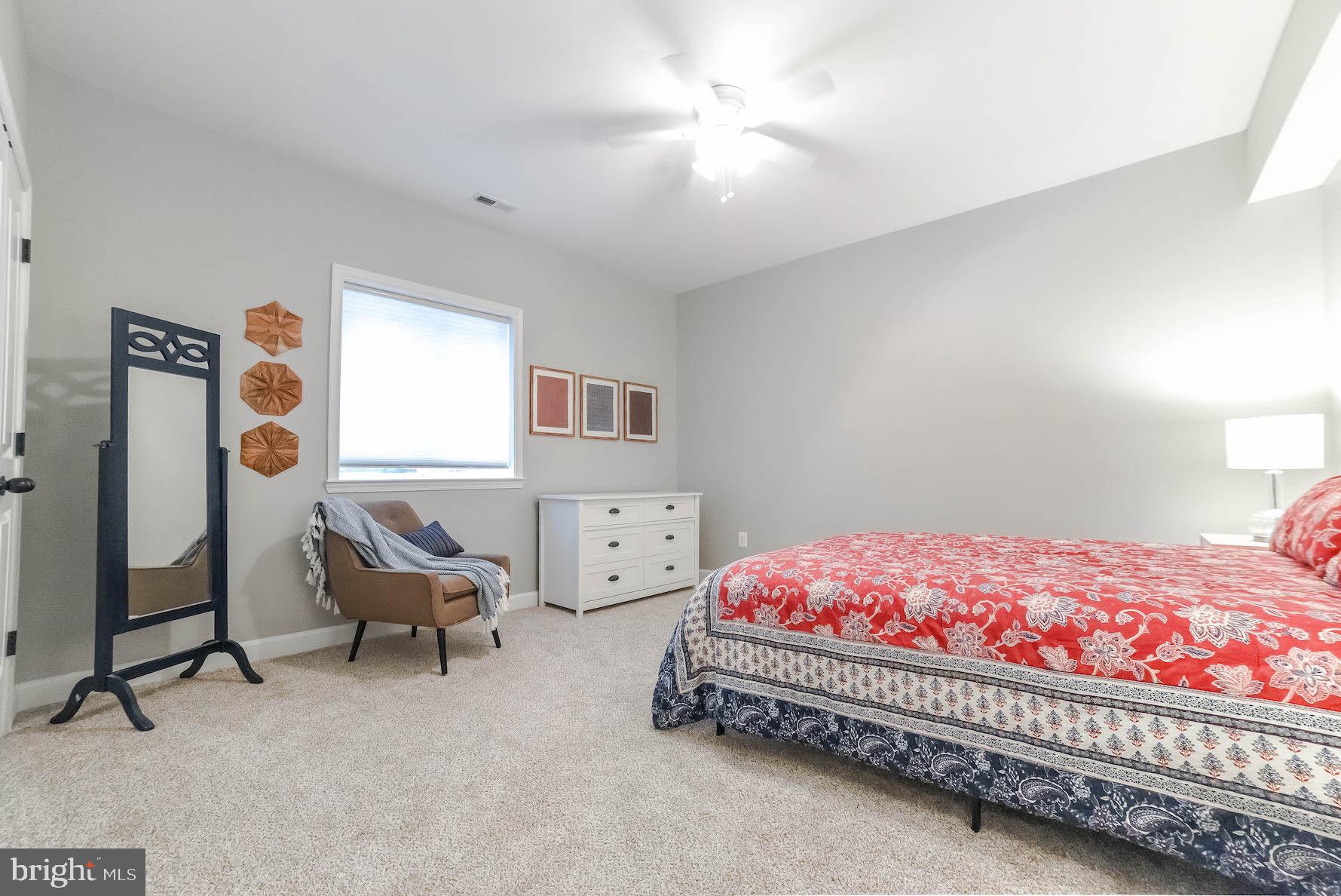 2160 Lowery Road Huntingtown, MD 20639 - Photo 46 of 53 a bedroom with bed and window