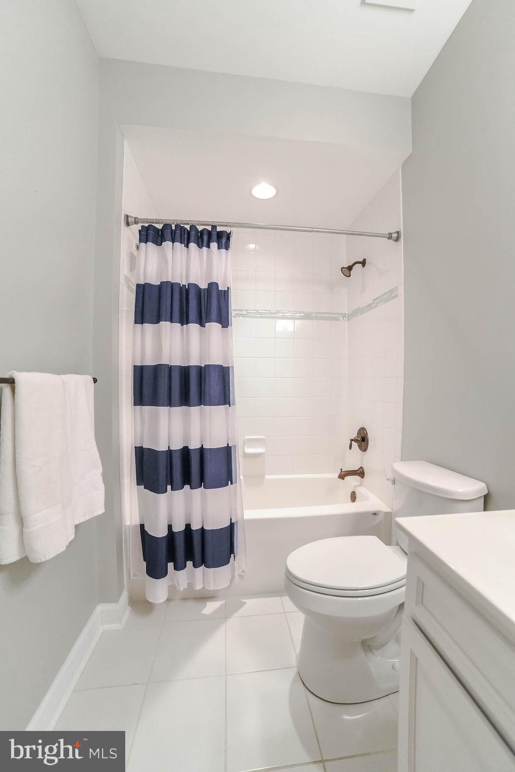 2160 Lowery Road Huntingtown, MD 20639 - Photo 48 of 53 a bathroom with a sink toilet a shower and bathtub