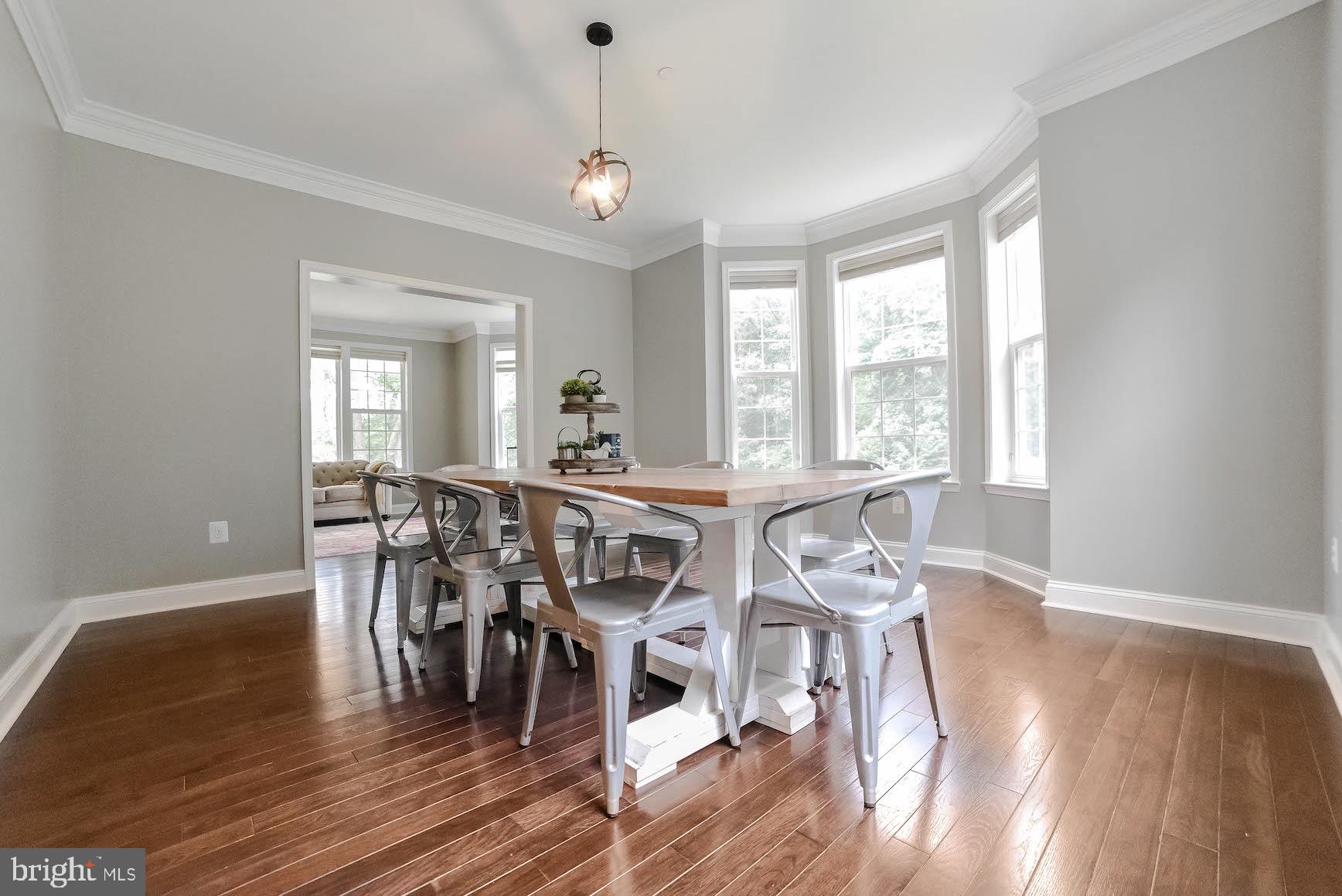 2160 Lowery Road Huntingtown, MD 20639 - Photo 6 of 53 a view of a dining room with furniture window and wooden floor