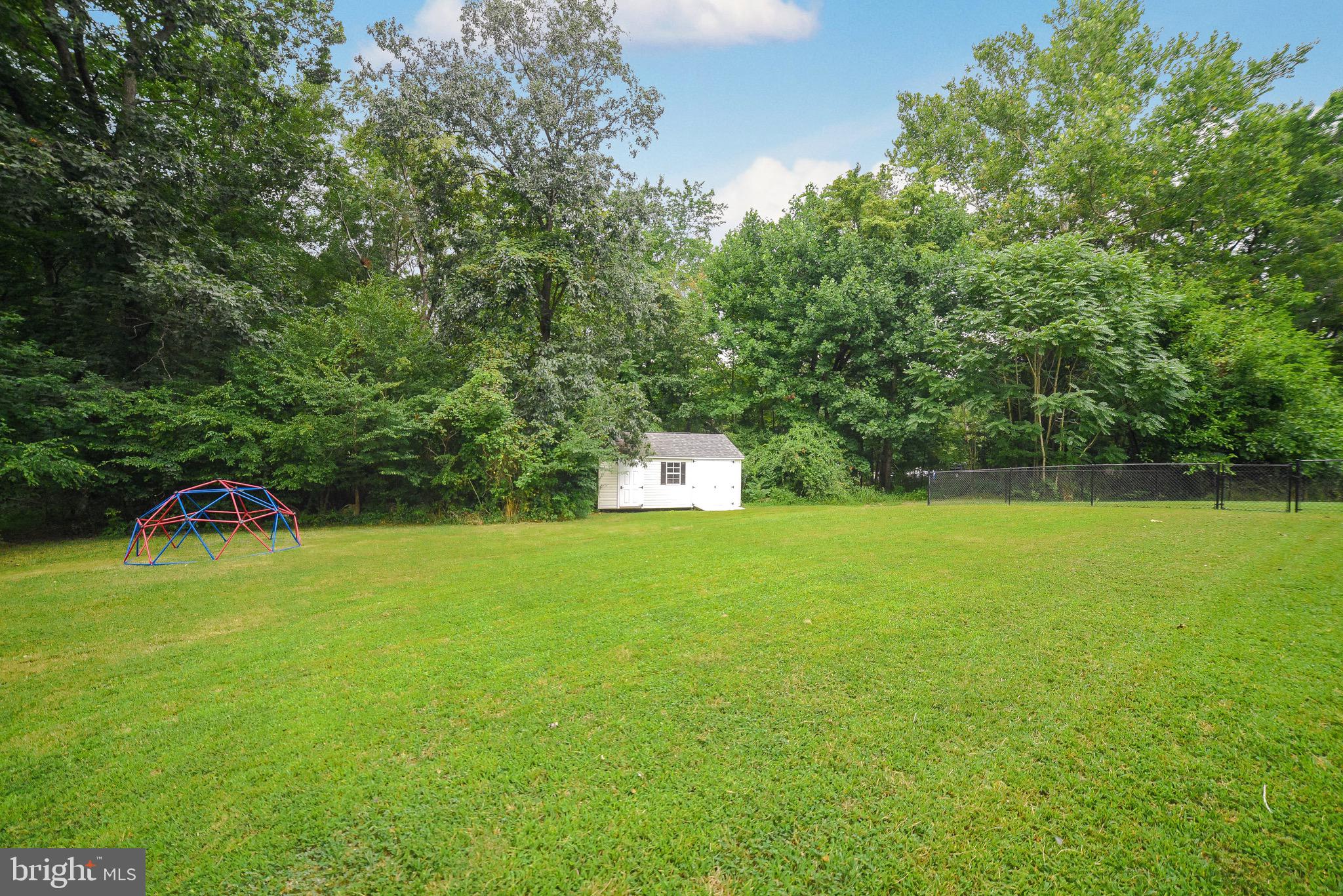 2160 Lowery Road Huntingtown, MD 20639 - Photo 52 of 53 a backyard of a house with lots of green space