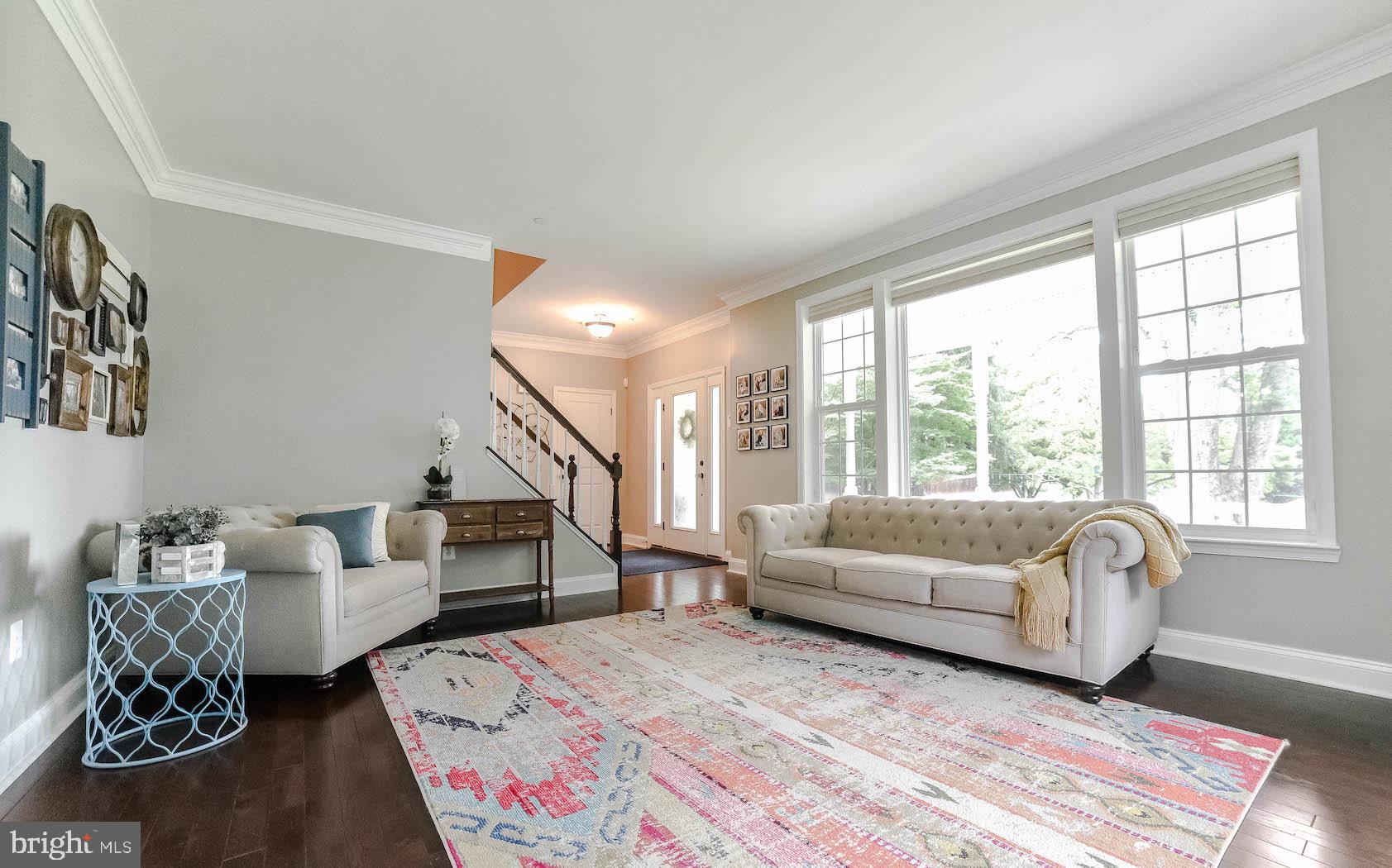 2160 Lowery Road Huntingtown, MD 20639 - Photo 10 of 53 a living room with furniture and a large window