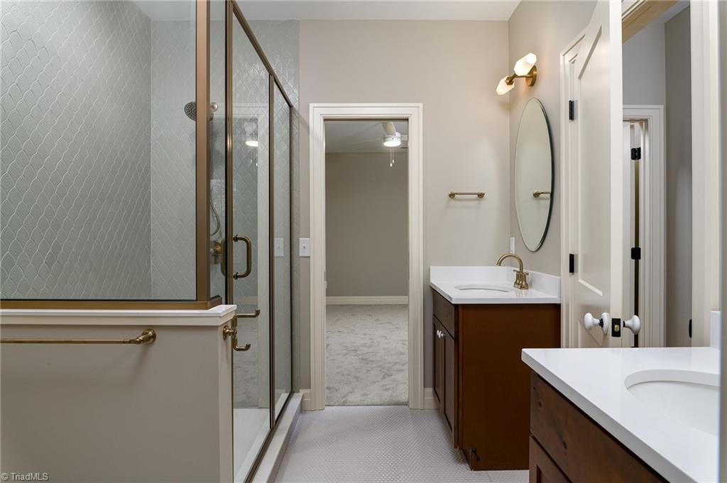 8268 Ballard Road Colfax, NC 27235 - Photo 35 of 50 A jack and jill design with a shared bathroom is just icing on the cake.