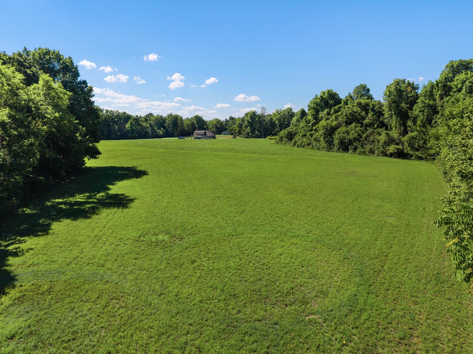 0 Dolan Road Drummonds, TN 38023 - Photo 8 of 10 a view of a golf course with a garden
