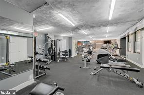 1836 Metzerott Road, Unit 901 Hyattsville, MD 20783 - Photo 17 of 20 a view of a room with gym equipment