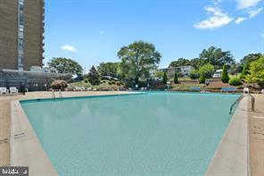1836 Metzerott Road, Unit 901 Hyattsville, MD 20783 - Photo 20 of 20 a view of a swimming pool and outdoor space