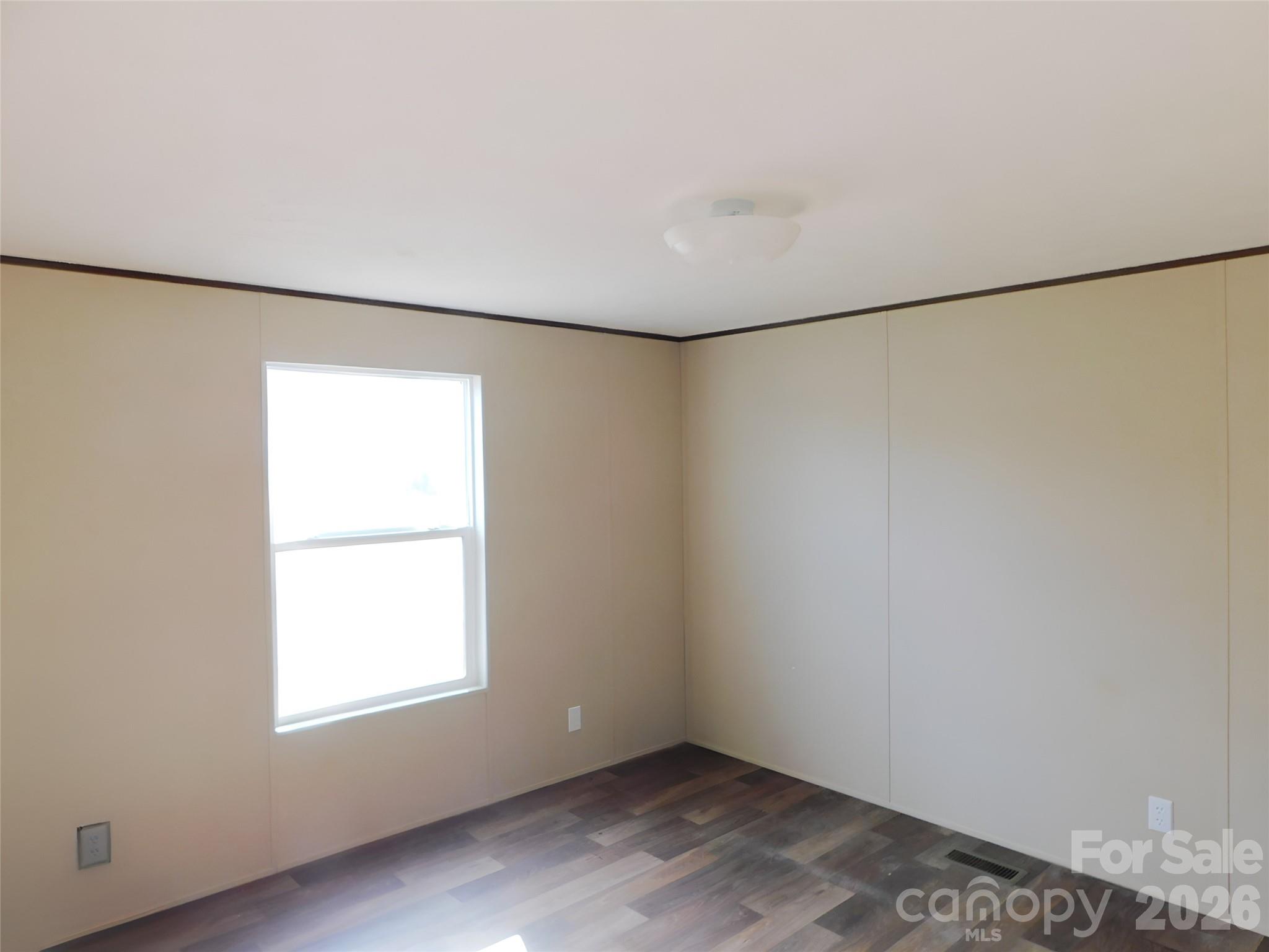 149 Bramble Trail Salisbury, NC 28144 - Photo 16 of 27 an empty room with a empty space and a window