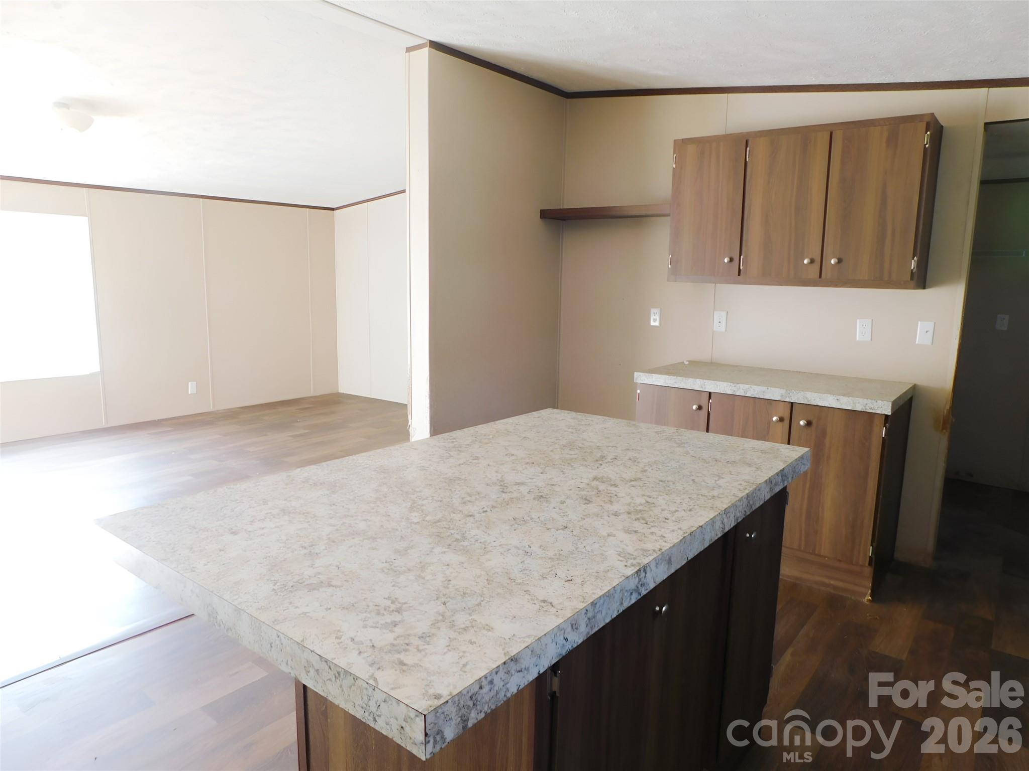149 Bramble Trail Salisbury, NC 28144 - Photo 6 of 27 a kitchen with a sink a cabinets and wooden floor