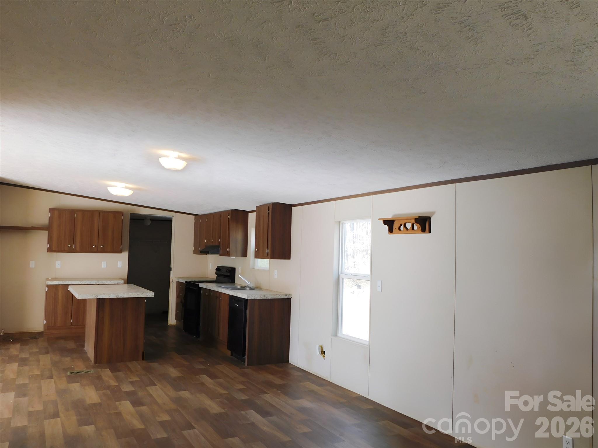 149 Bramble Trail Salisbury, NC 28144 - Photo 9 of 27 a kitchen with stainless steel appliances a refrigerator and a stove top oven
