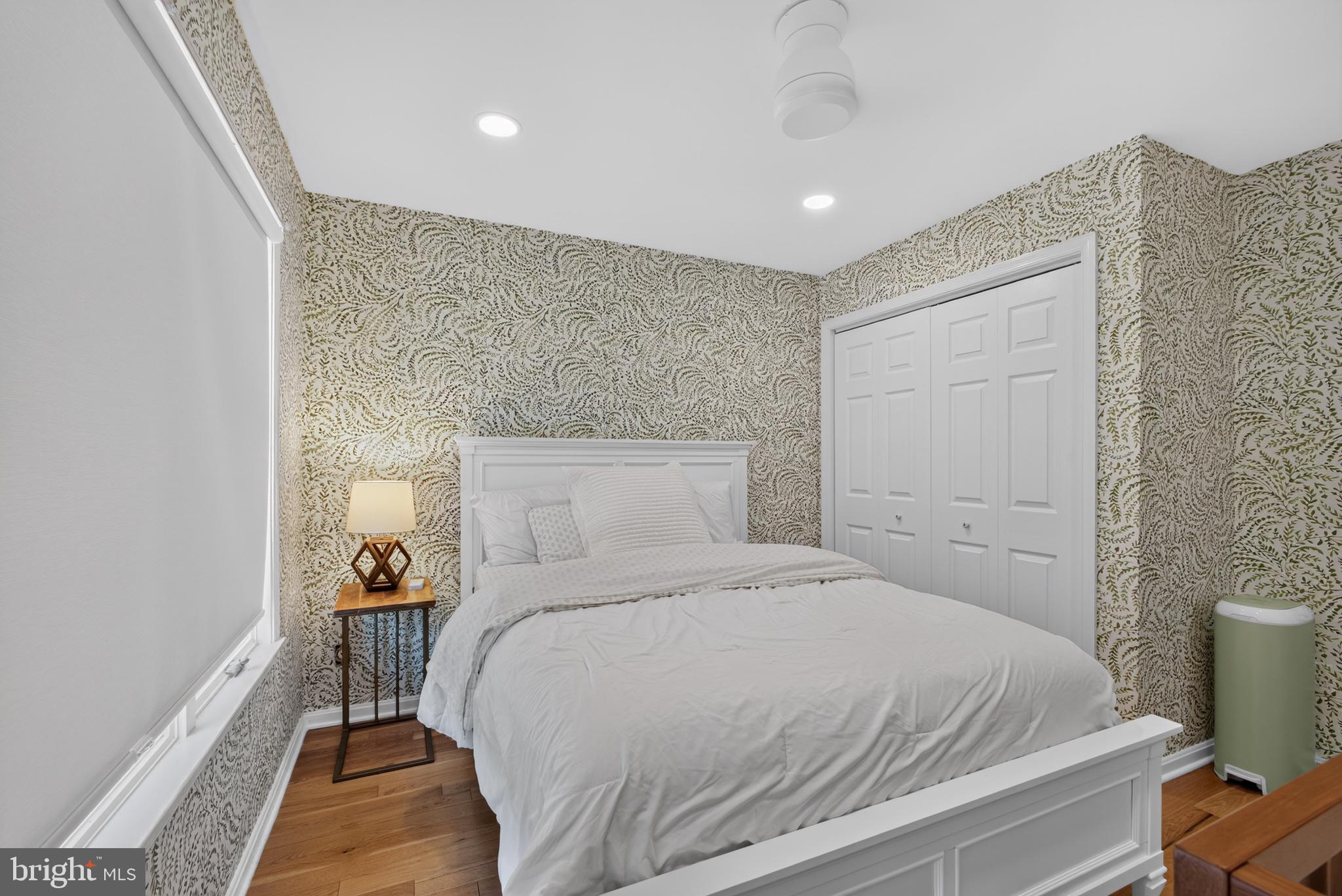 108 Spot Club Road Arnold, MD 21012 - Photo 22 of 30 Charming bedroom with stylish wallpaper.