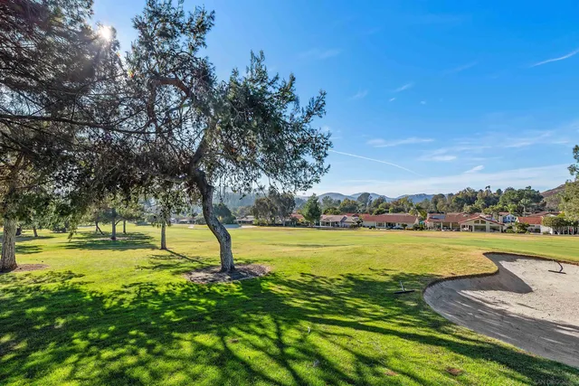 a view of an ocean from a pool