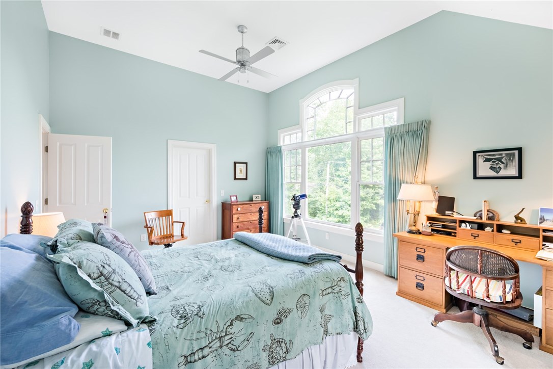 71 Wagner Road Westerly, RI 02891 - Photo 27 of 37 This room features a large window that looks out onto the landscape, and allows for bird watching.