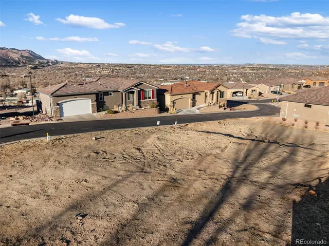 a view of a city with an ocean