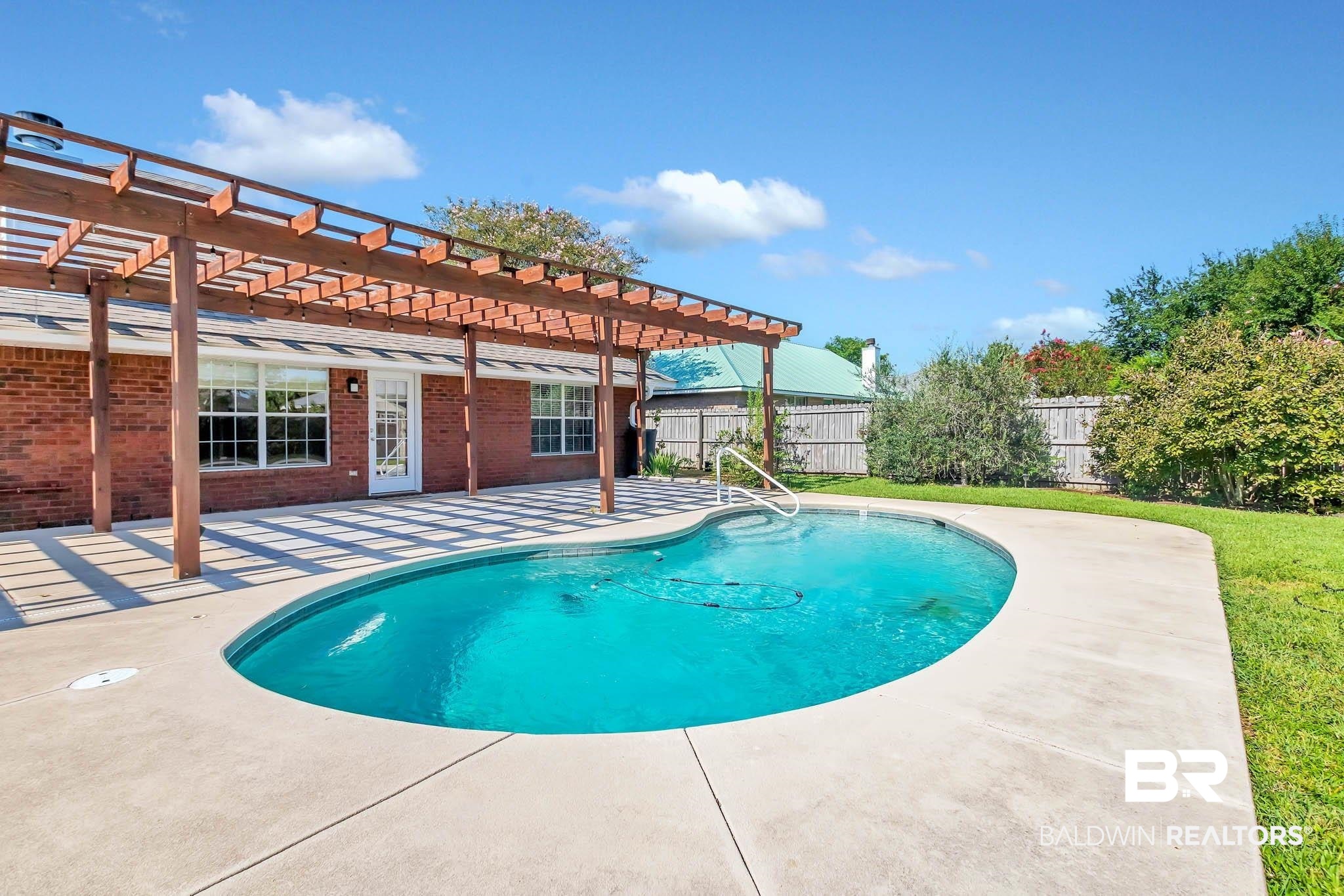9607 Czar Court Fairhope, AL 36532 - Photo 39 of 42 View of swimming pool featuring a pergola, a fenced backyard, and a patio