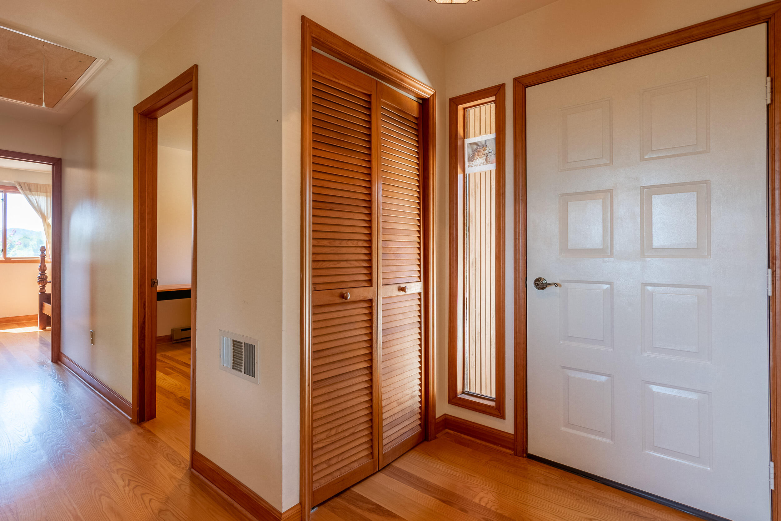 995 White Oak Grove Road Northeast Riner, VA 24149 - Photo 11 of 70 a view of a hallway with wooden floor and closet