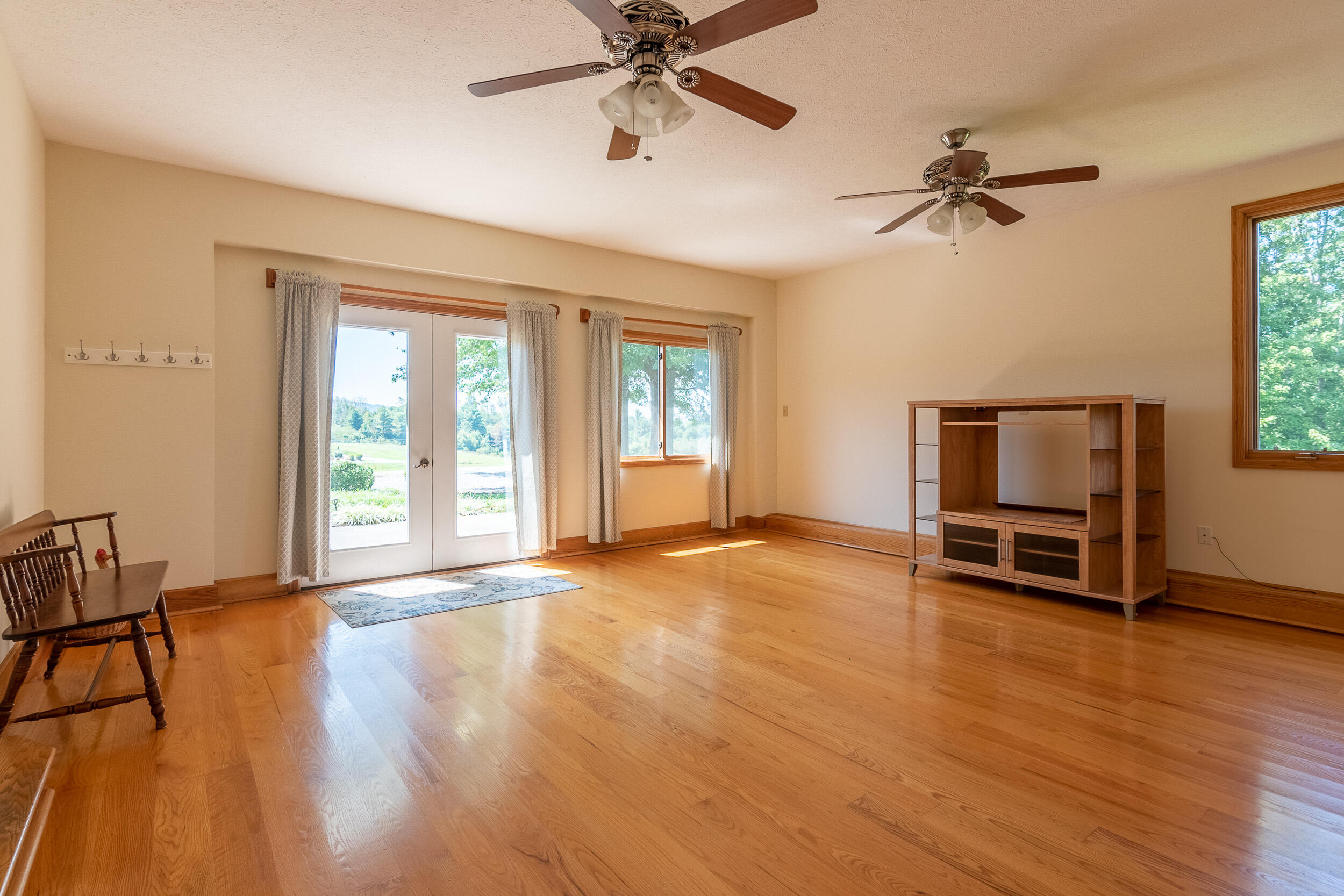995 White Oak Grove Road Northeast Riner, VA 24149 - Photo 31 of 70 a view of an empty room with a window and wooden floor