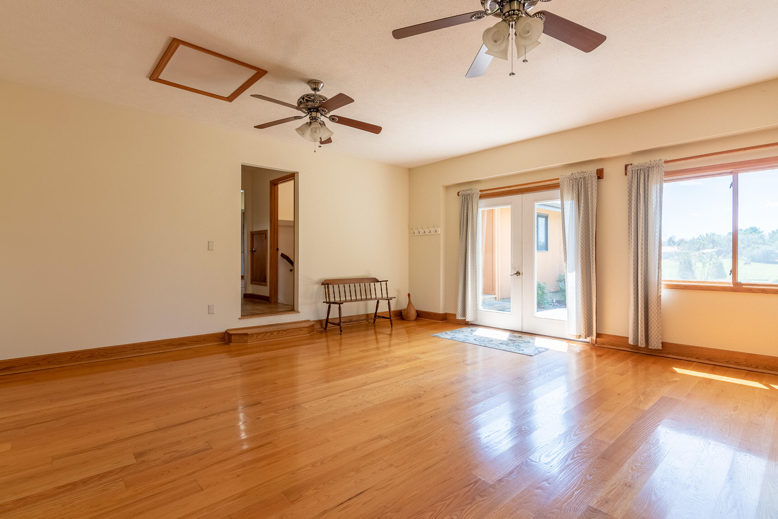 995 White Oak Grove Road Northeast Riner, VA 24149 - Photo 33 of 70 a view of an empty room with window and wooden floor