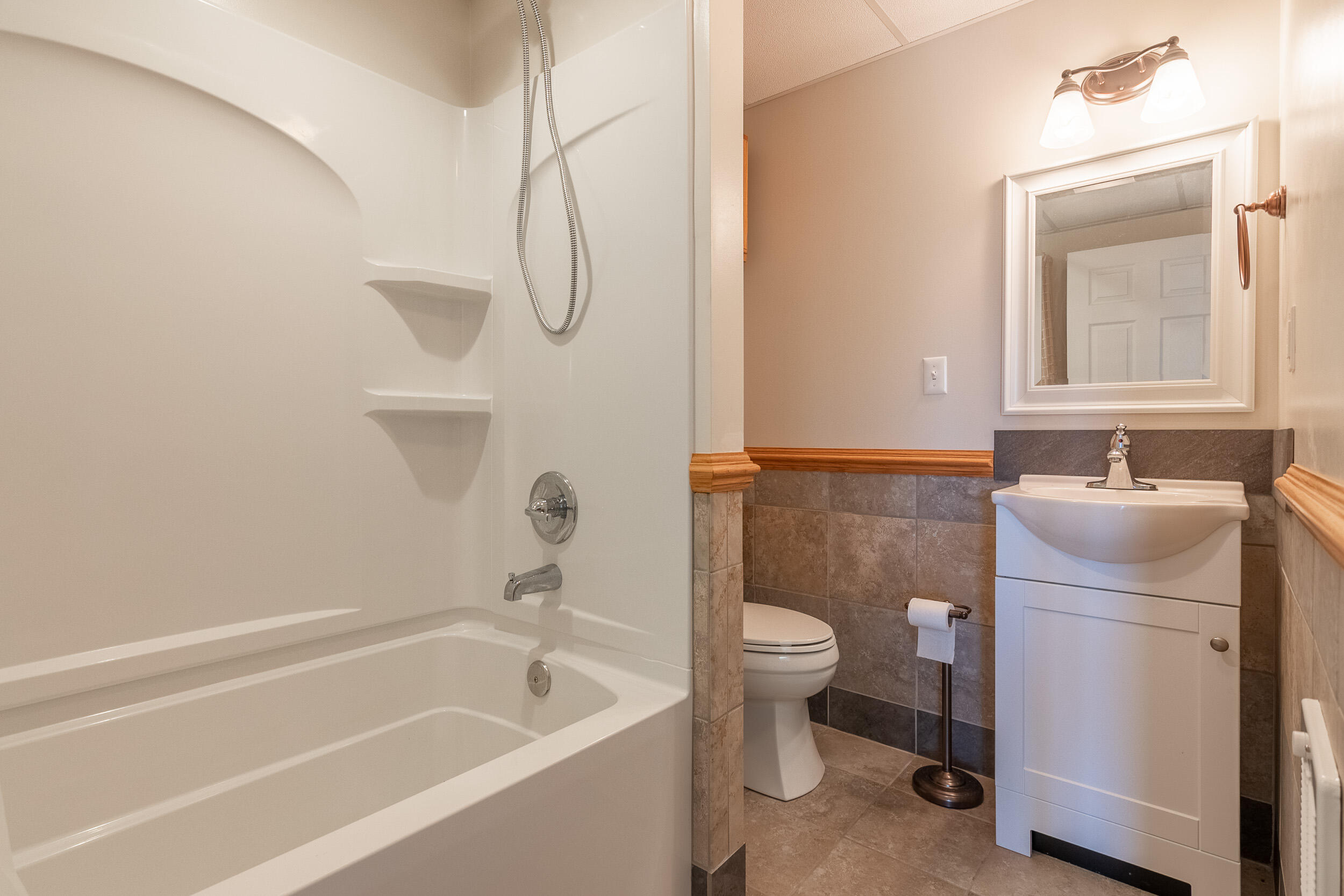 995 White Oak Grove Road Northeast Riner, VA 24149 - Photo 40 of 70 a bathroom with a sink a toilet and shower