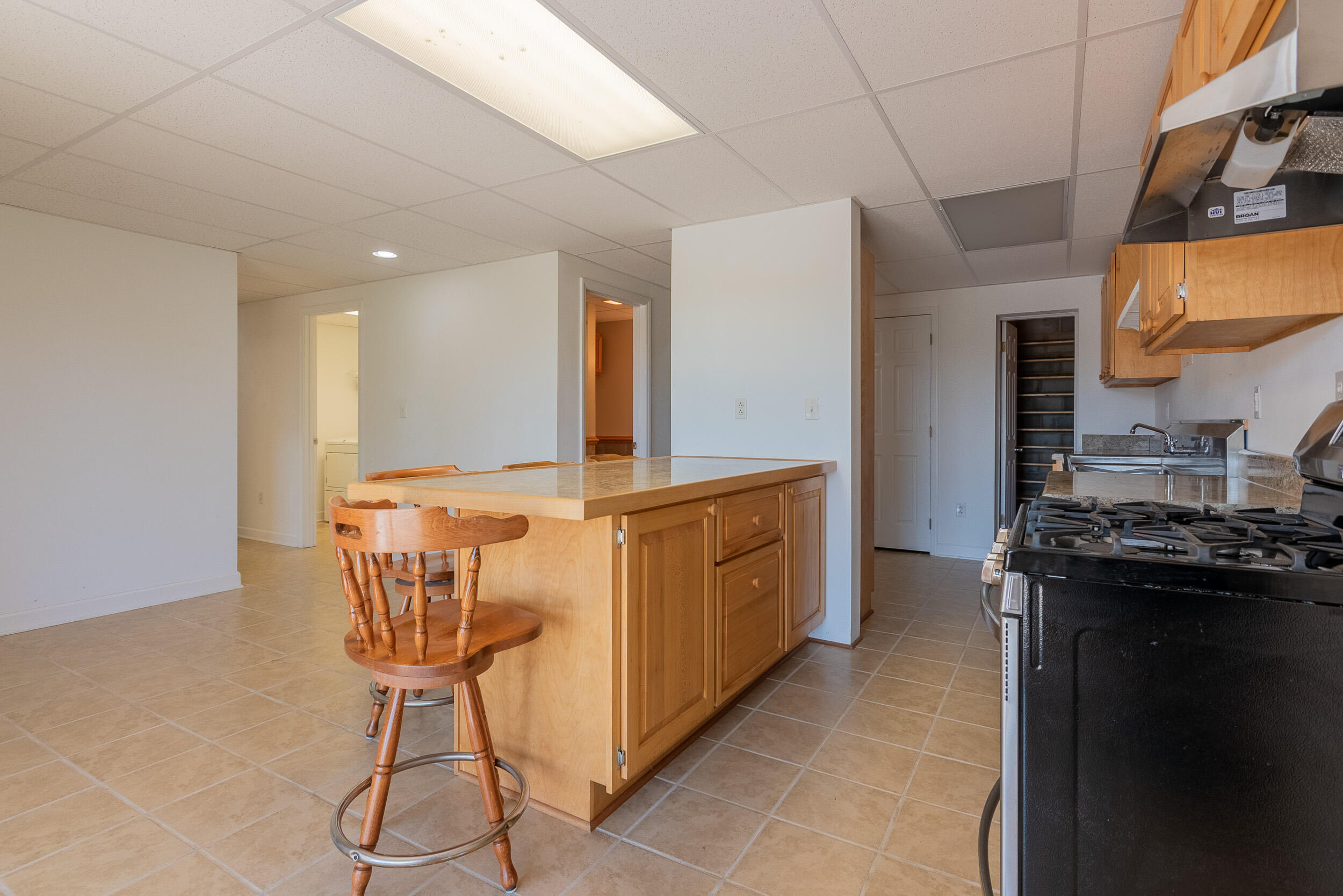 995 White Oak Grove Road Northeast Riner, VA 24149 - Photo 45 of 70 a kitchen with stainless steel appliances granite countertop a stove a sink and a refrigerator
