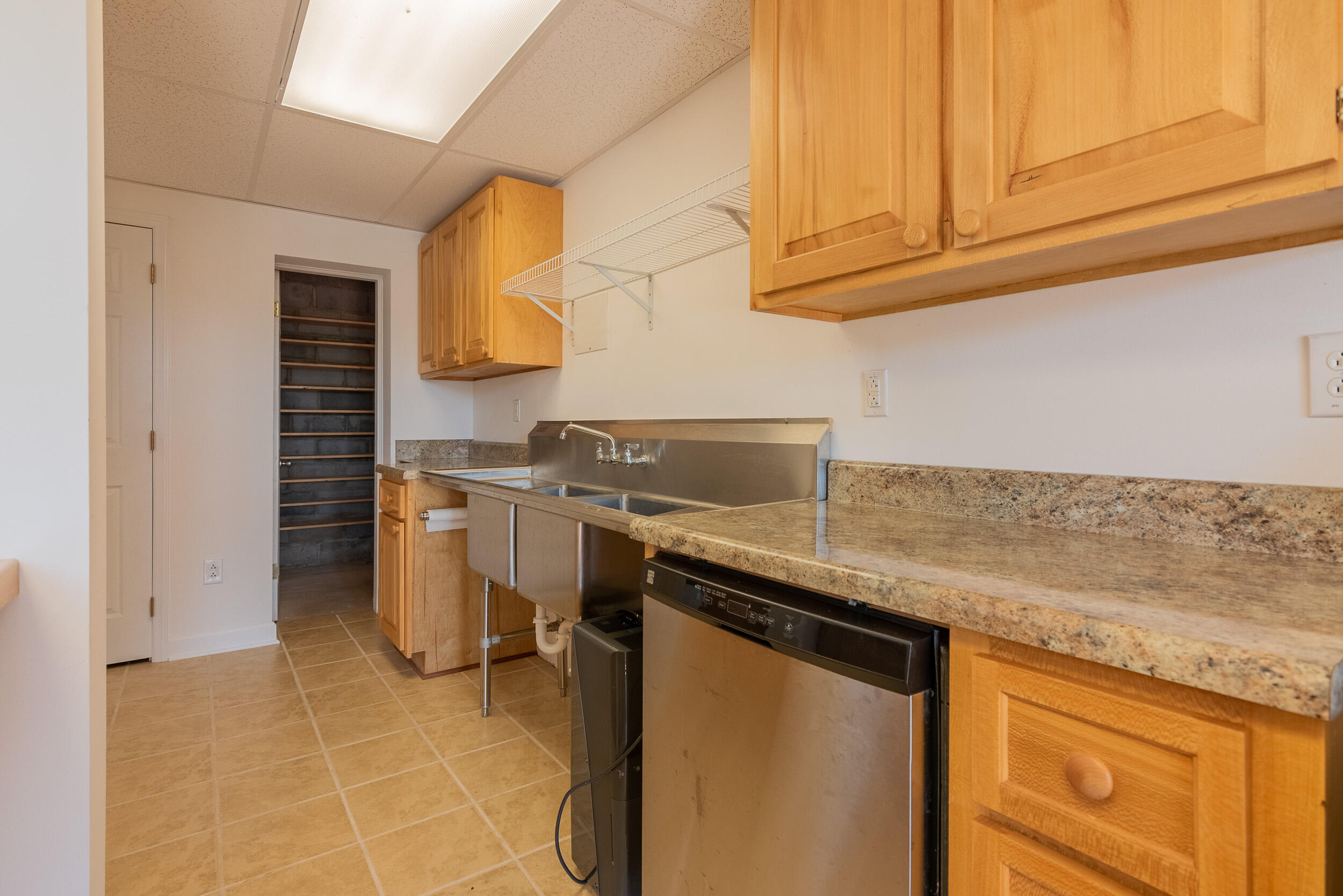 995 White Oak Grove Road Northeast Riner, VA 24149 - Photo 46 of 70 a kitchen with granite countertop a sink cabinets and stainless steel appliances