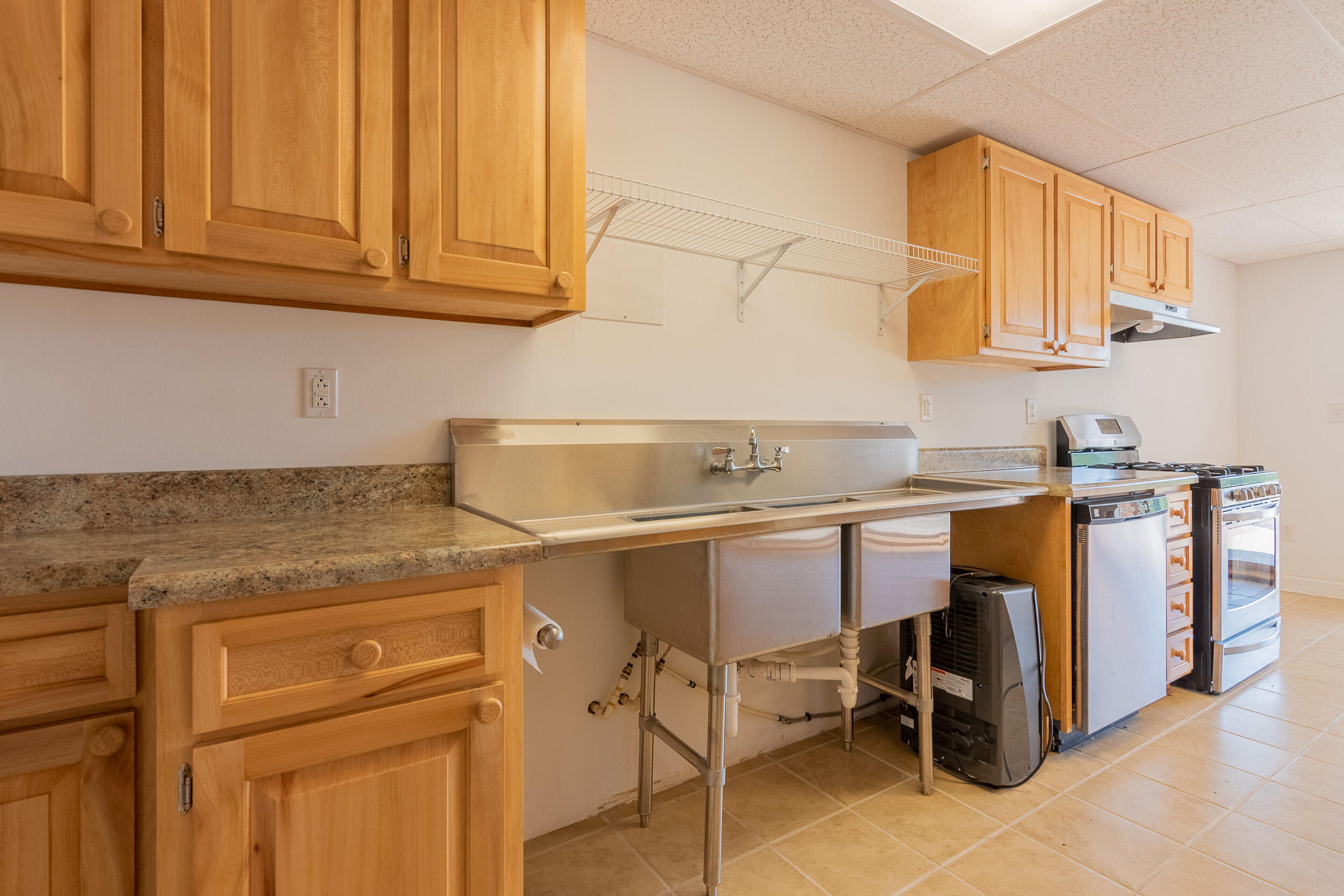 995 White Oak Grove Road Northeast Riner, VA 24149 - Photo 47 of 70 a kitchen with a sink cabinets and appliances