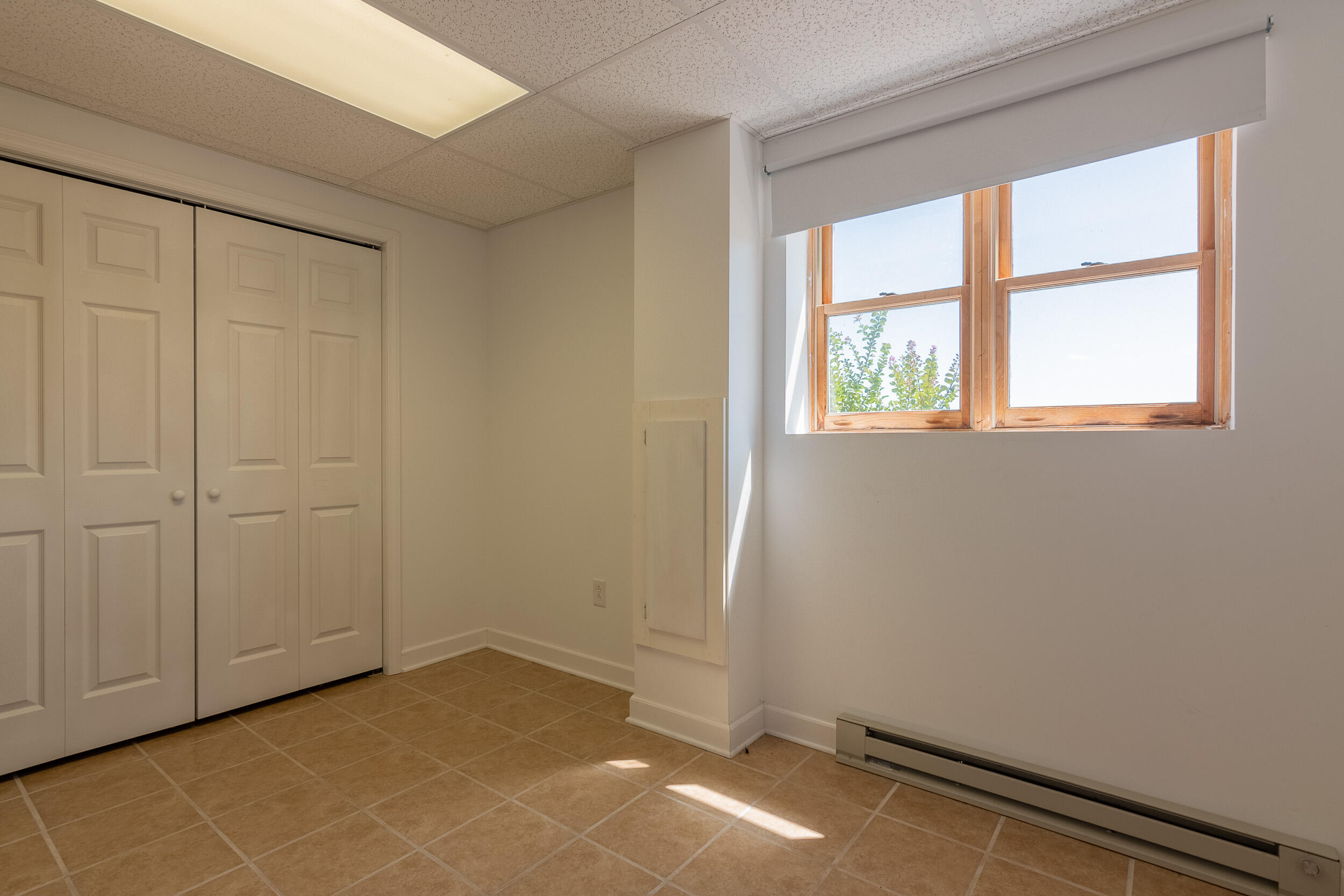 995 White Oak Grove Road Northeast Riner, VA 24149 - Photo 54 of 70 an empty room with windows